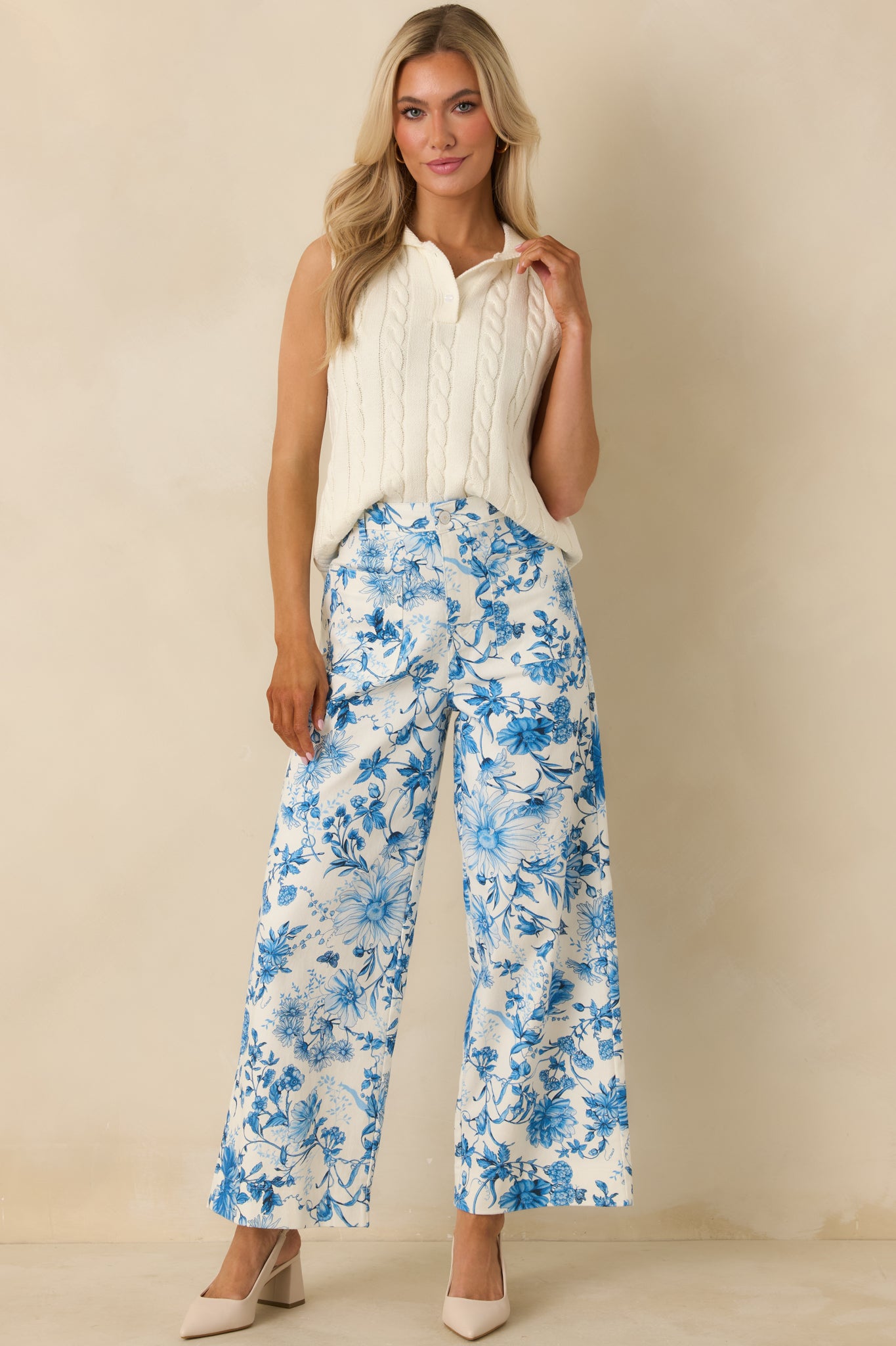 Relaxed-fit cotton pants with a straight wide leg, functional front pockets, and flattering high-rise design.