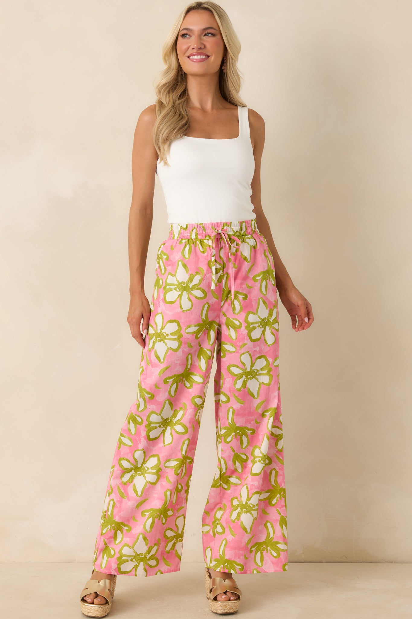 Relaxed-fit floral pants featuring side pockets and a bold botanical print designed for effortless, standout style.