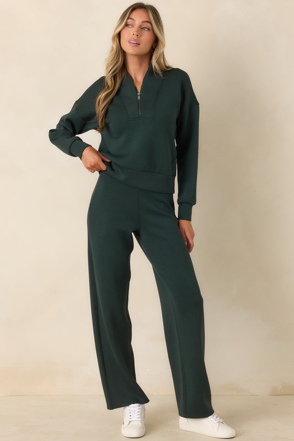 Relaxed fit pants showcasing a streamlined waistband and easy drape from hip to hem.