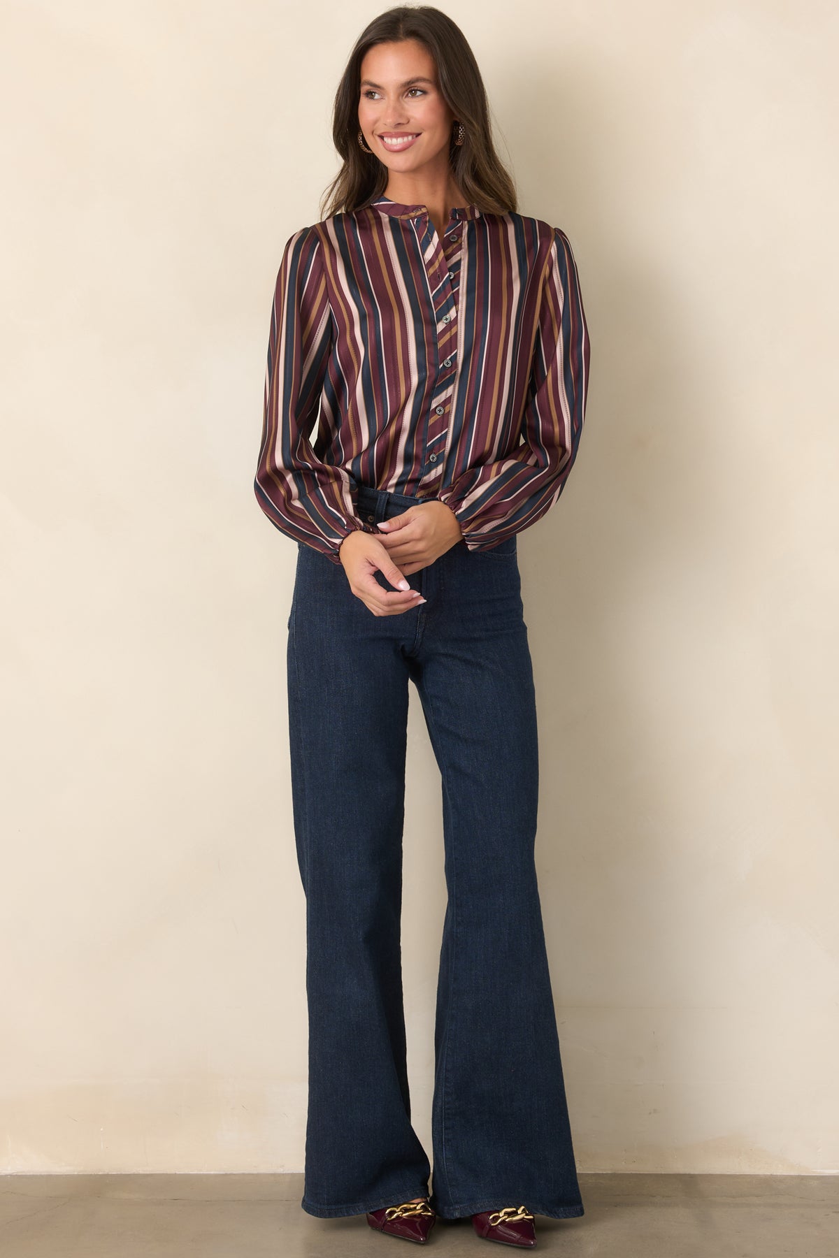 Relaxed satin top with a band collar and softly gathered balloon sleeves.