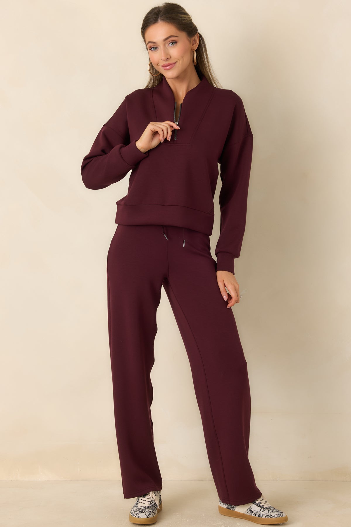 Relaxed spacer-fabric pullover with a sculptural shawl collar and half-zip neckline.