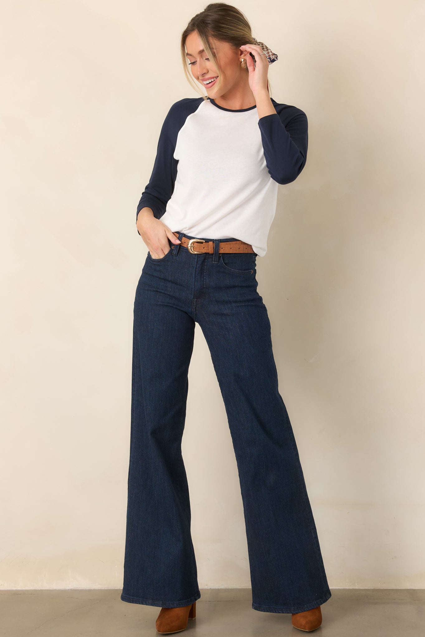 Wide-leg jeans featuring a relaxed fit through the legs, traditional five-pocket styling, belt loops, and a classic button-and-zip fly.