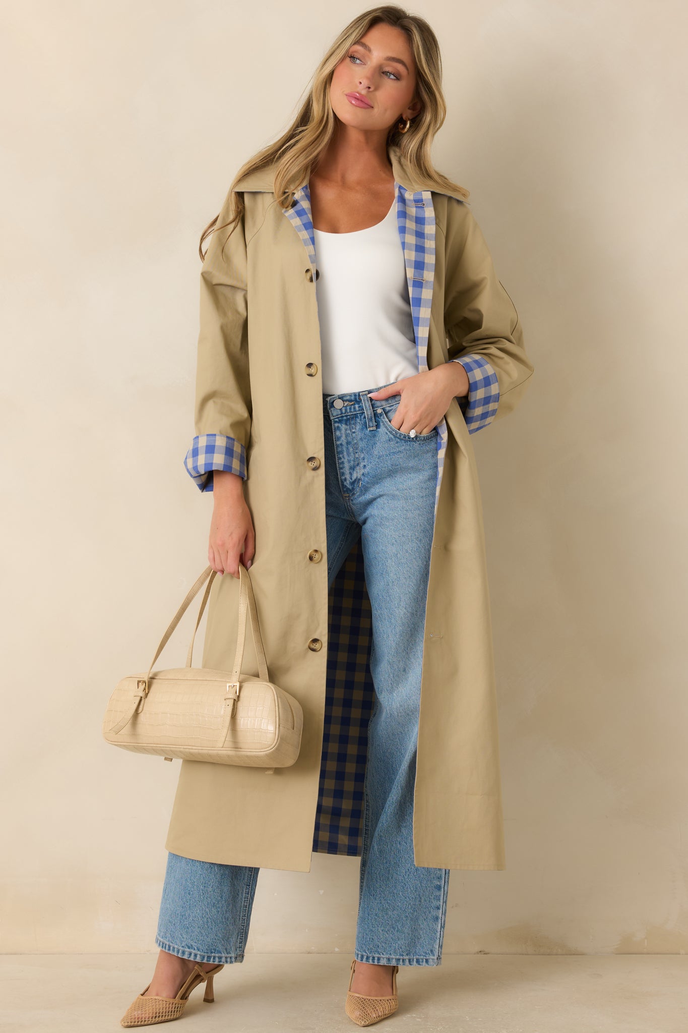 Reversible cotton long coat styled with the Beige side outward, featuring a contrasting collar, button-front closure, and matching waist tie.