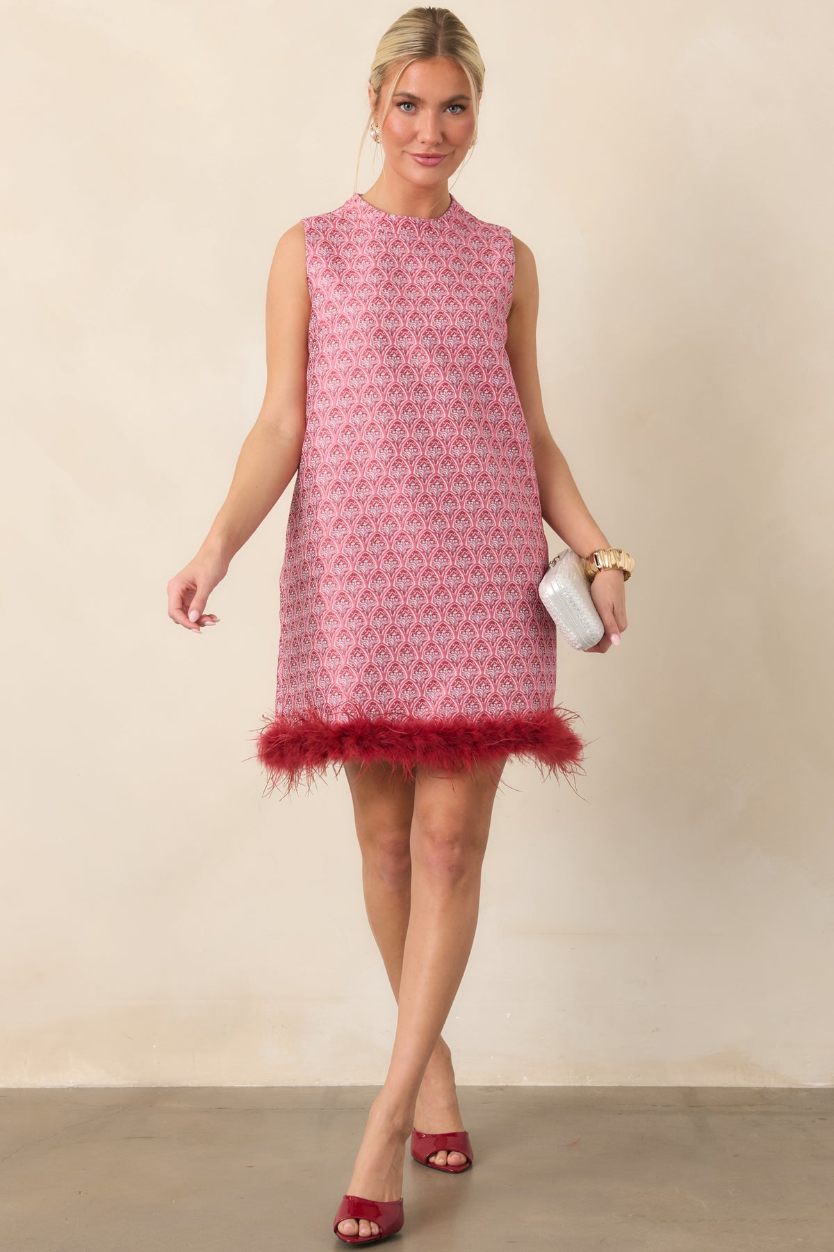 Ornate floral mini dress featuring rose pink and burgundy detailing with a relaxed shift silhouette.