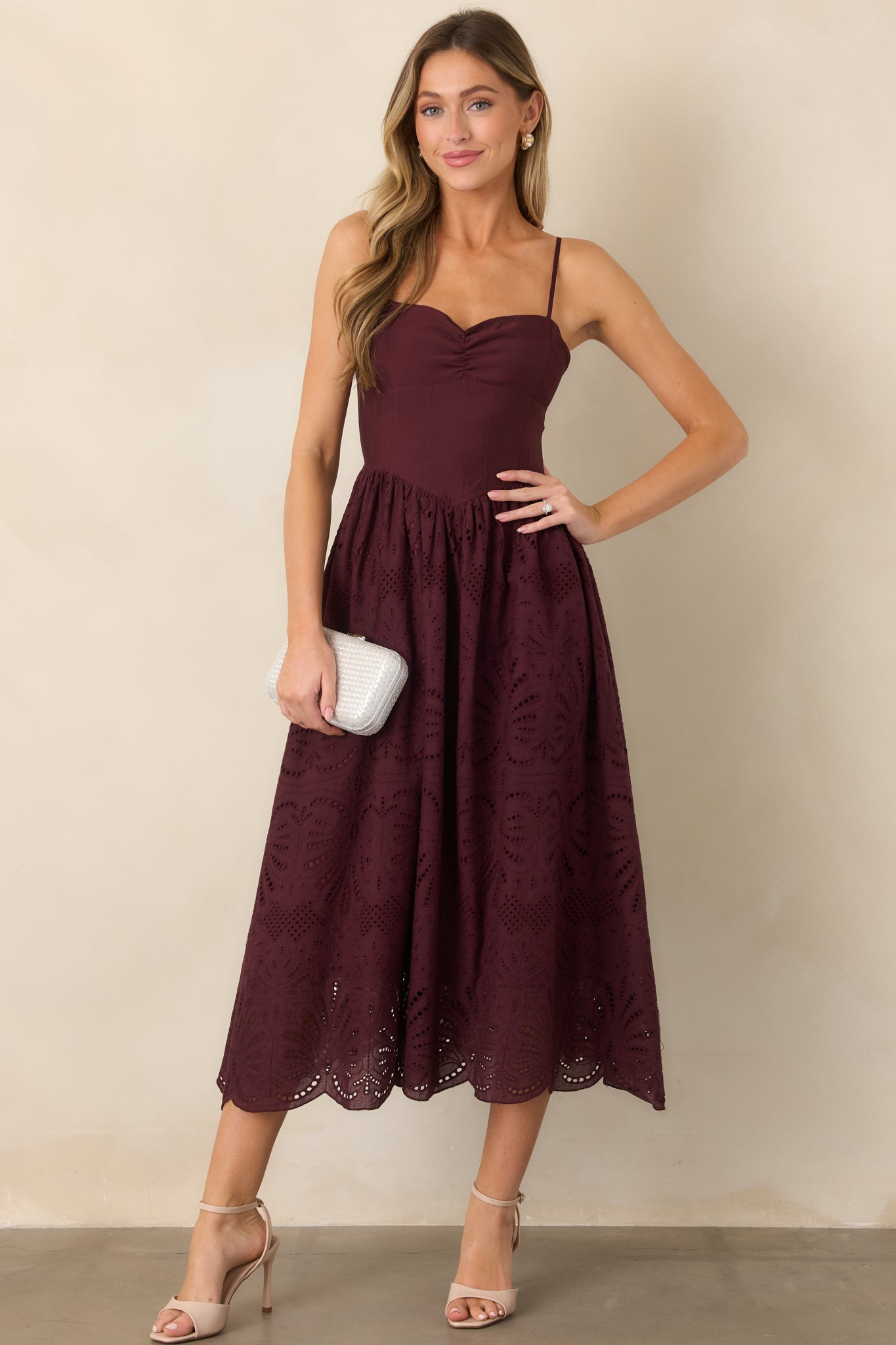 Tencel™ lyocell blend dress highlighting the softly ruched sweetheart bodice, slender adjustable straps, and airy eyelet skirt.