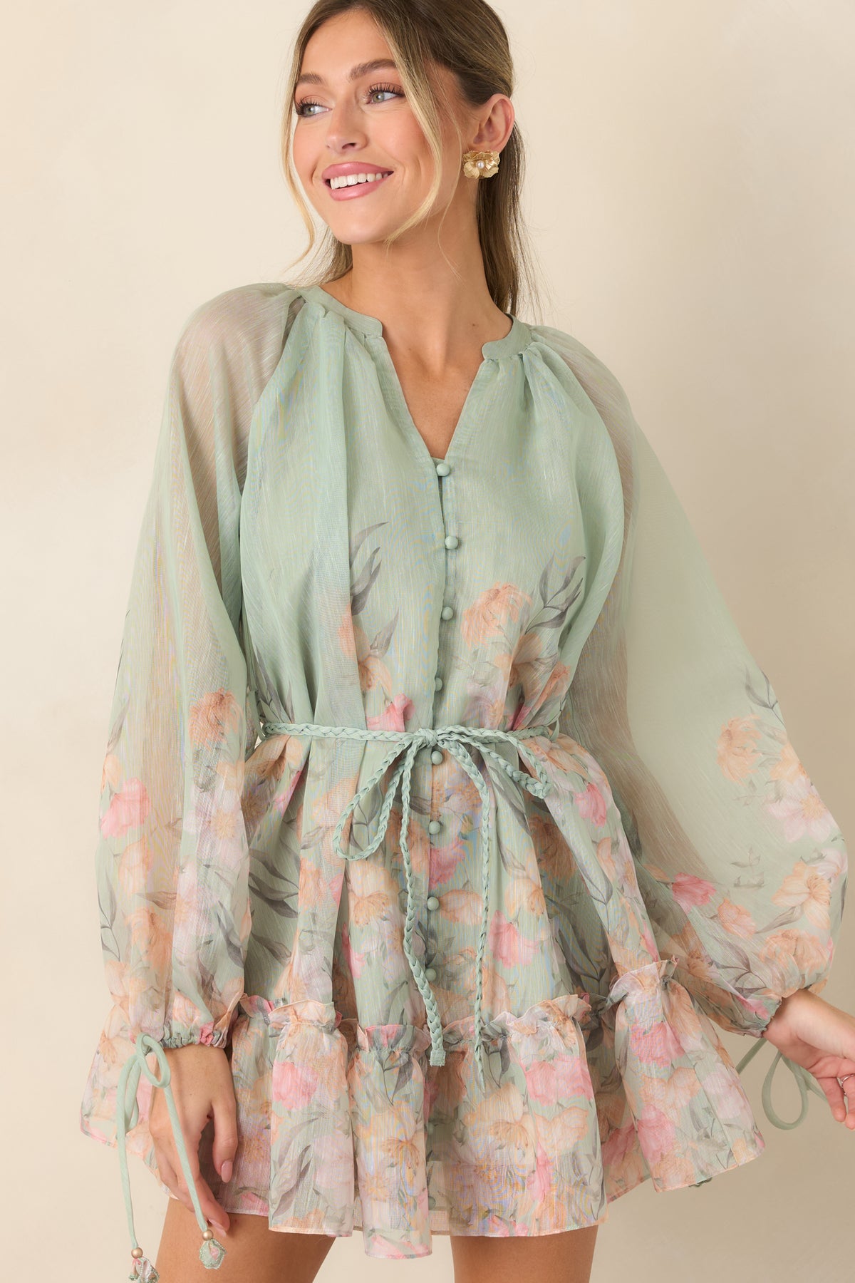 Sage floral mini dress showcasing the braided belt and softly gathered waist.