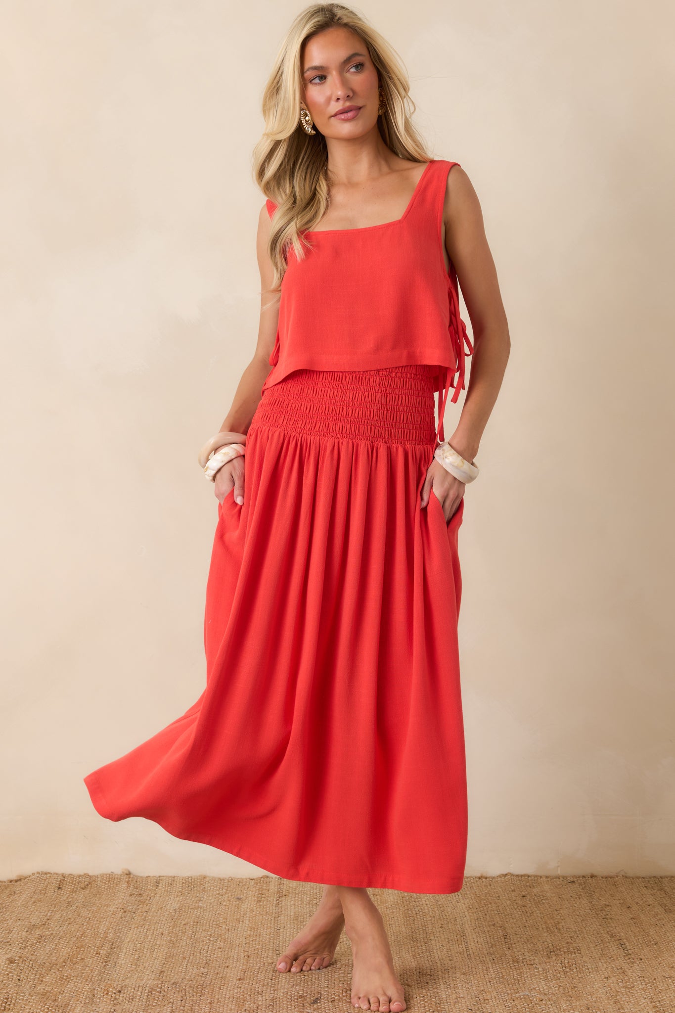 Sangria maxi dress with a comfortable smocked bodice, softly gathered waist, and an airy full-length skirt that creates an effortlessly flowing silhouette.