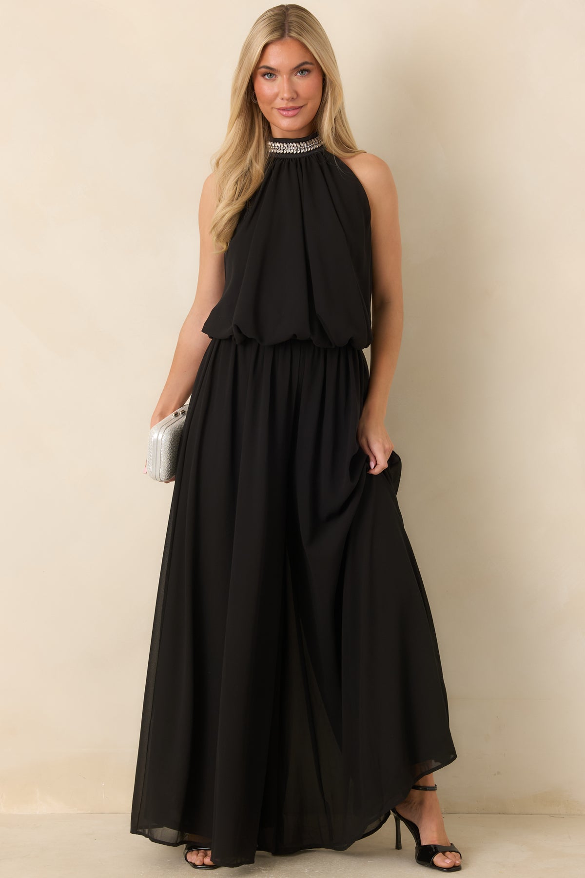 Sheer overlay pants with separate wide legs creating a flowing skirt-like shape.