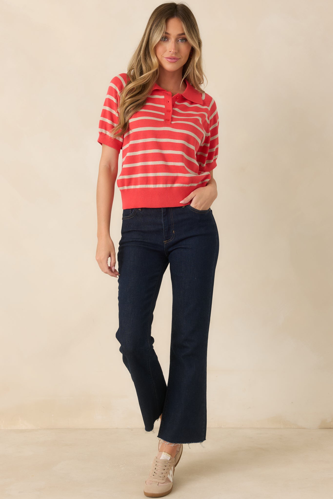 Short sleeve striped top with a relaxed silhouette, ribbed trim, and a classic collared neckline.