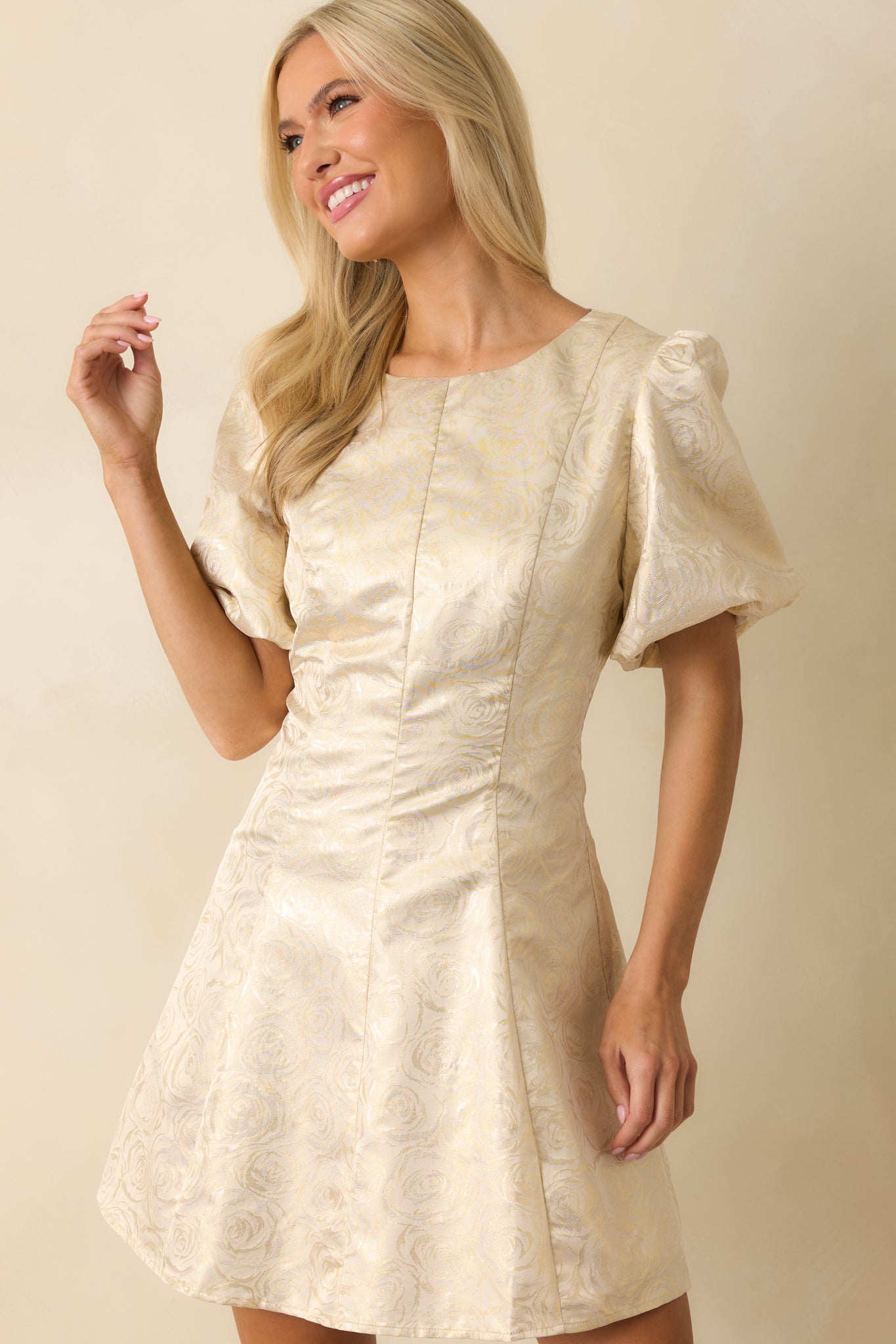 Side crop highlighting the bodice’s structure and gentle drape of the flared skirt.