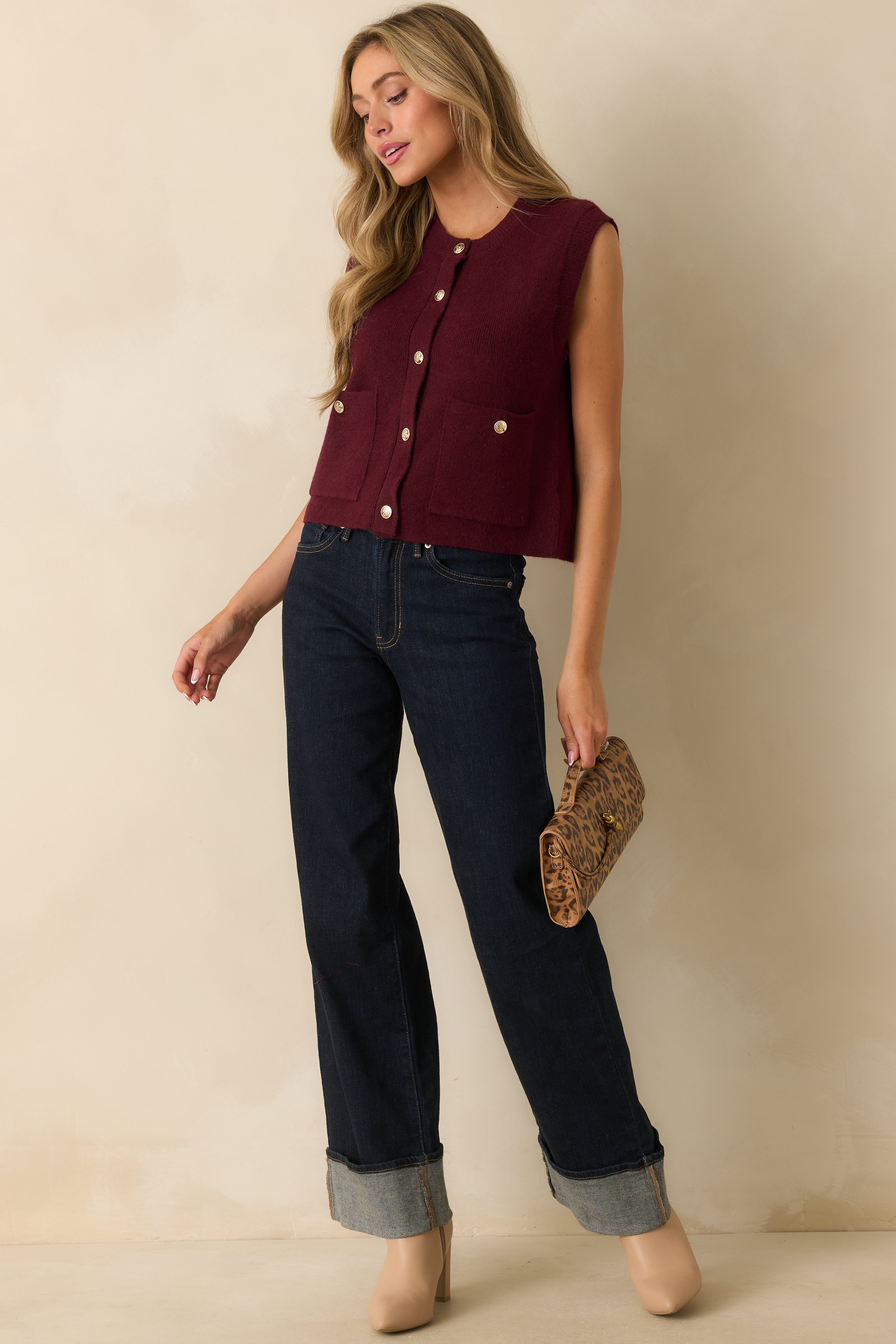 Slight side-front angle highlighting the patch pockets and structured knit fabric.