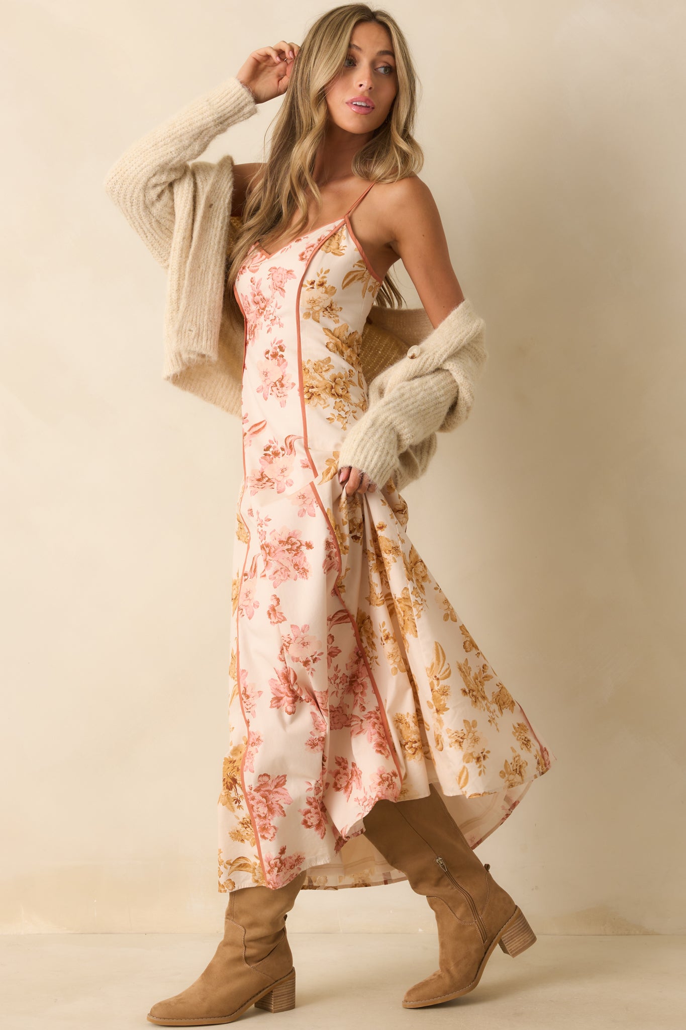 A posed side shot emphasizing the clay trim details along the dress panels.