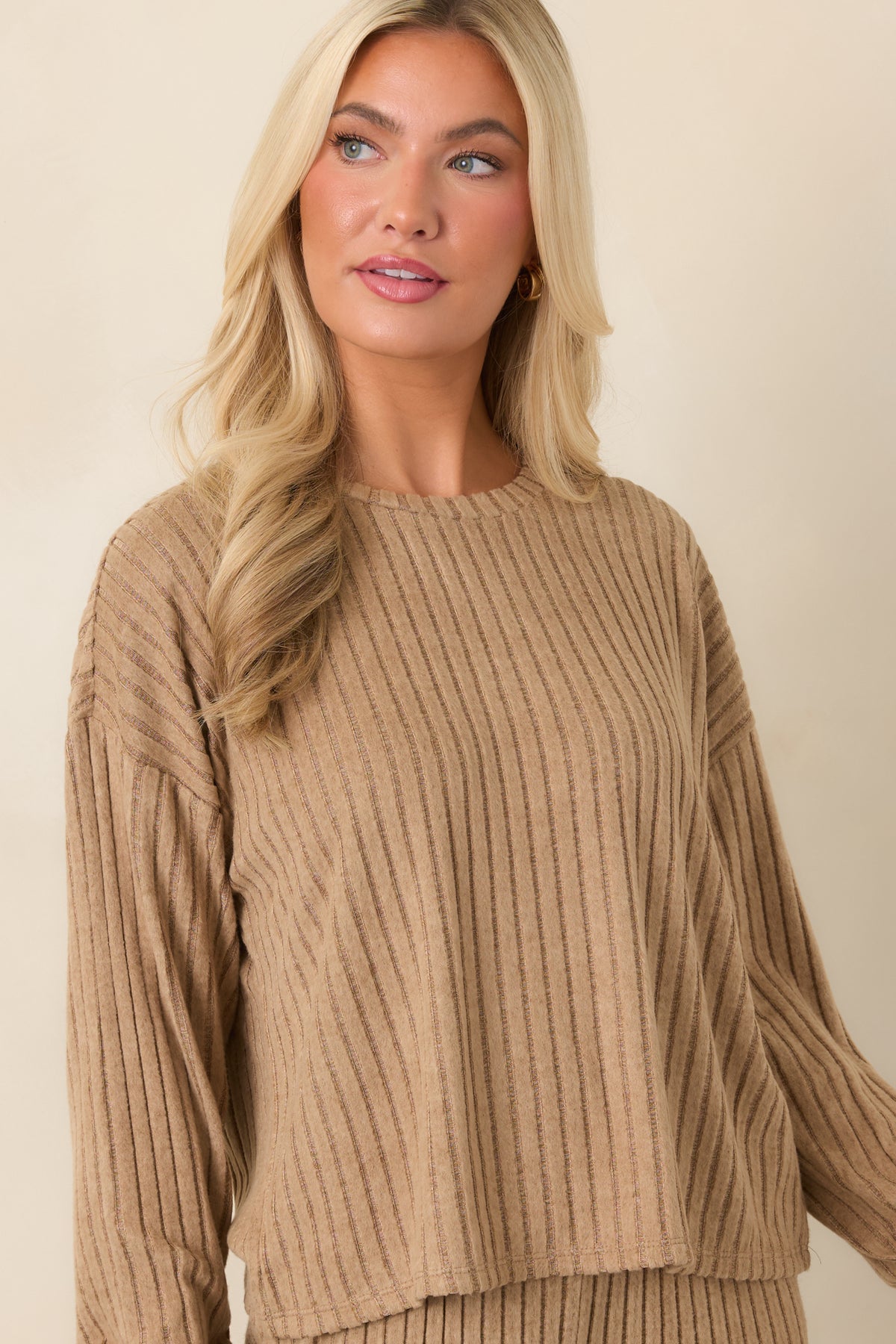 Silky-rib top featuring softly draped fabric and comfortable stretch throughout.