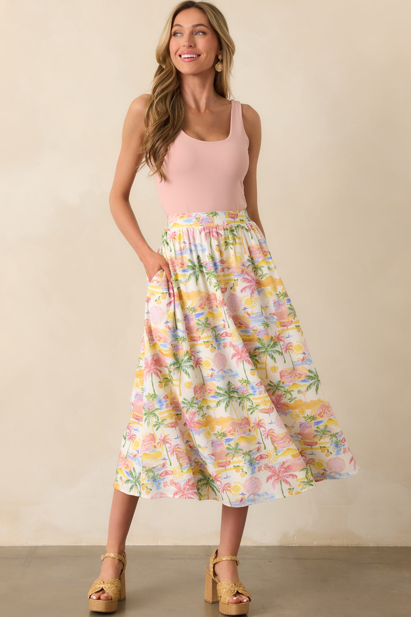 Complete look highlighting the skirt’s ankle-grazing length, colorful tropical pattern, and soft drape.