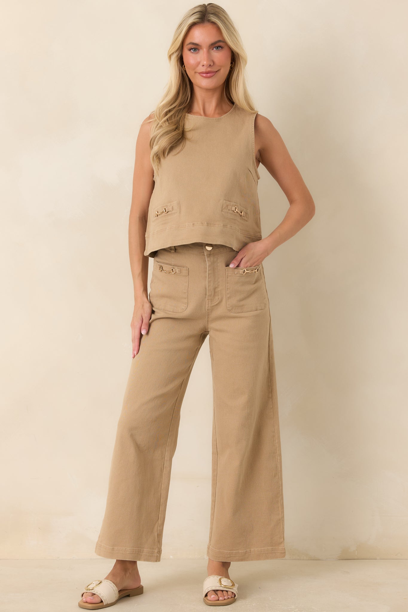 Sleeveless cotton-blend denim top featuring a round neckline, relaxed A-line silhouette, and polished gold-tone horsebit accents.