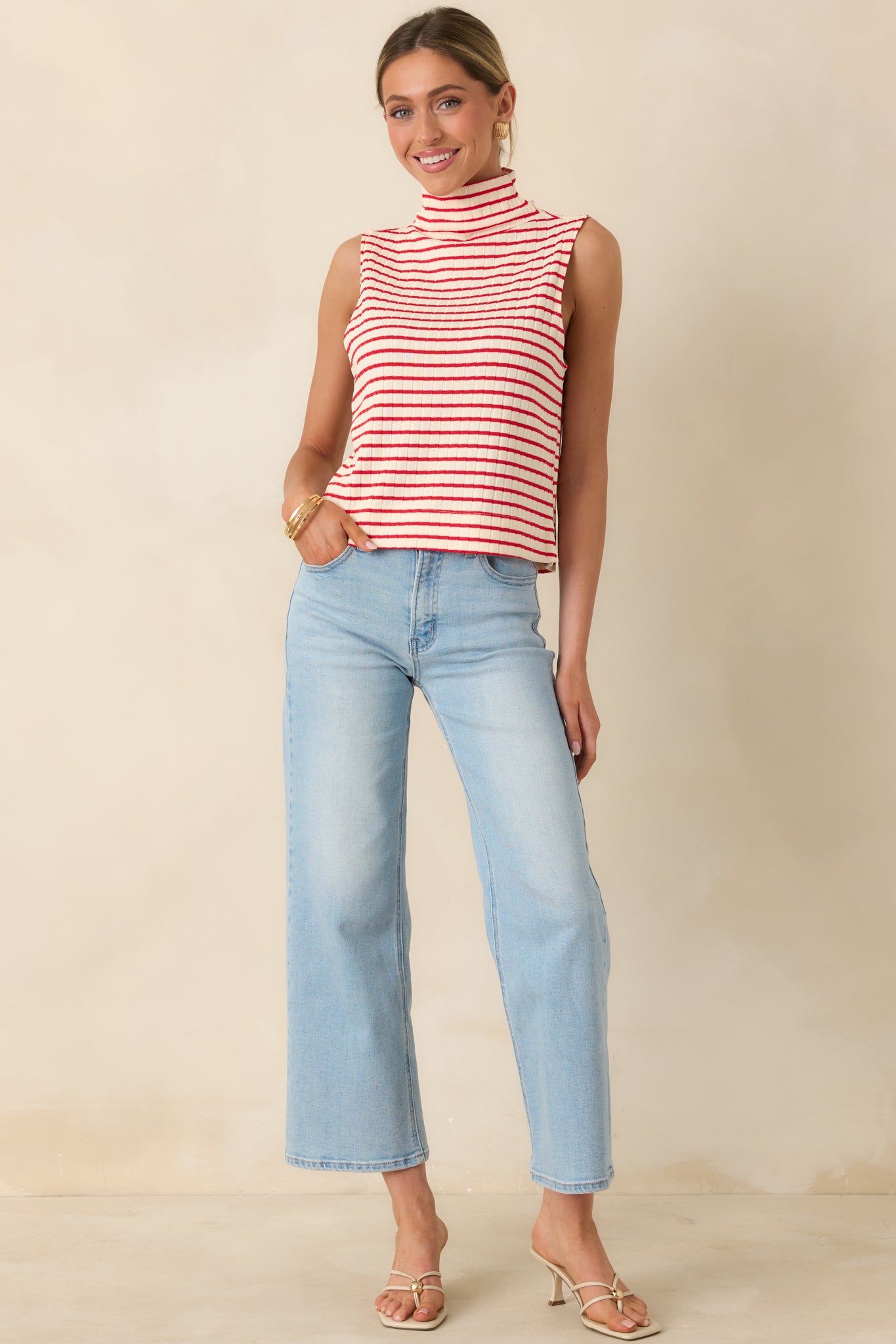 Sleeveless striped top with fitted silhouette and soft ribbed texture.