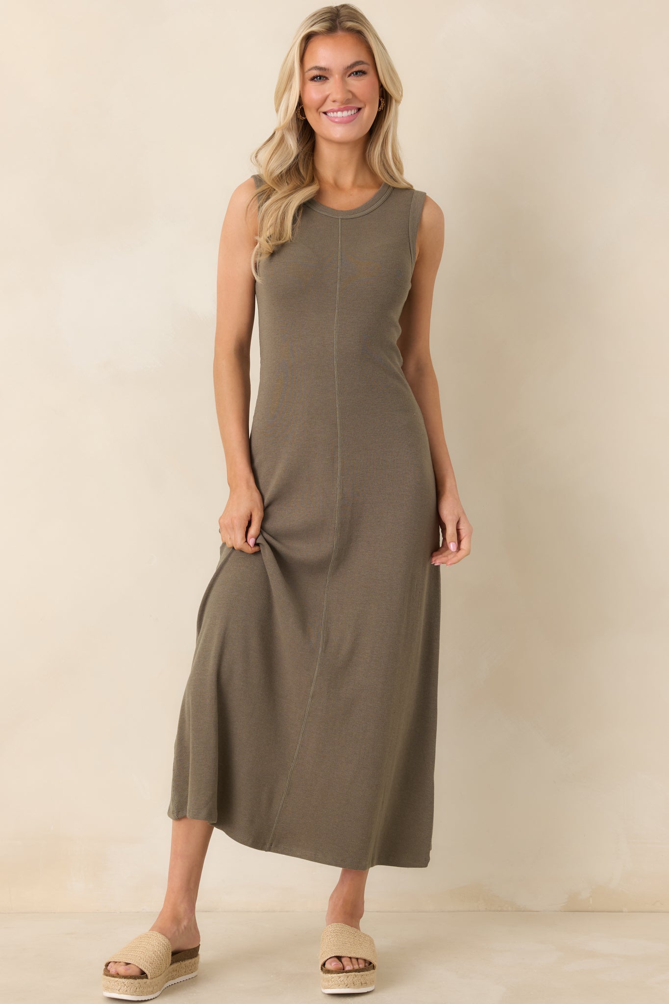 Slub rib knit maxi dress in khaki green featuring a crew neckline and structured bodice flowing into a relaxed skirt.