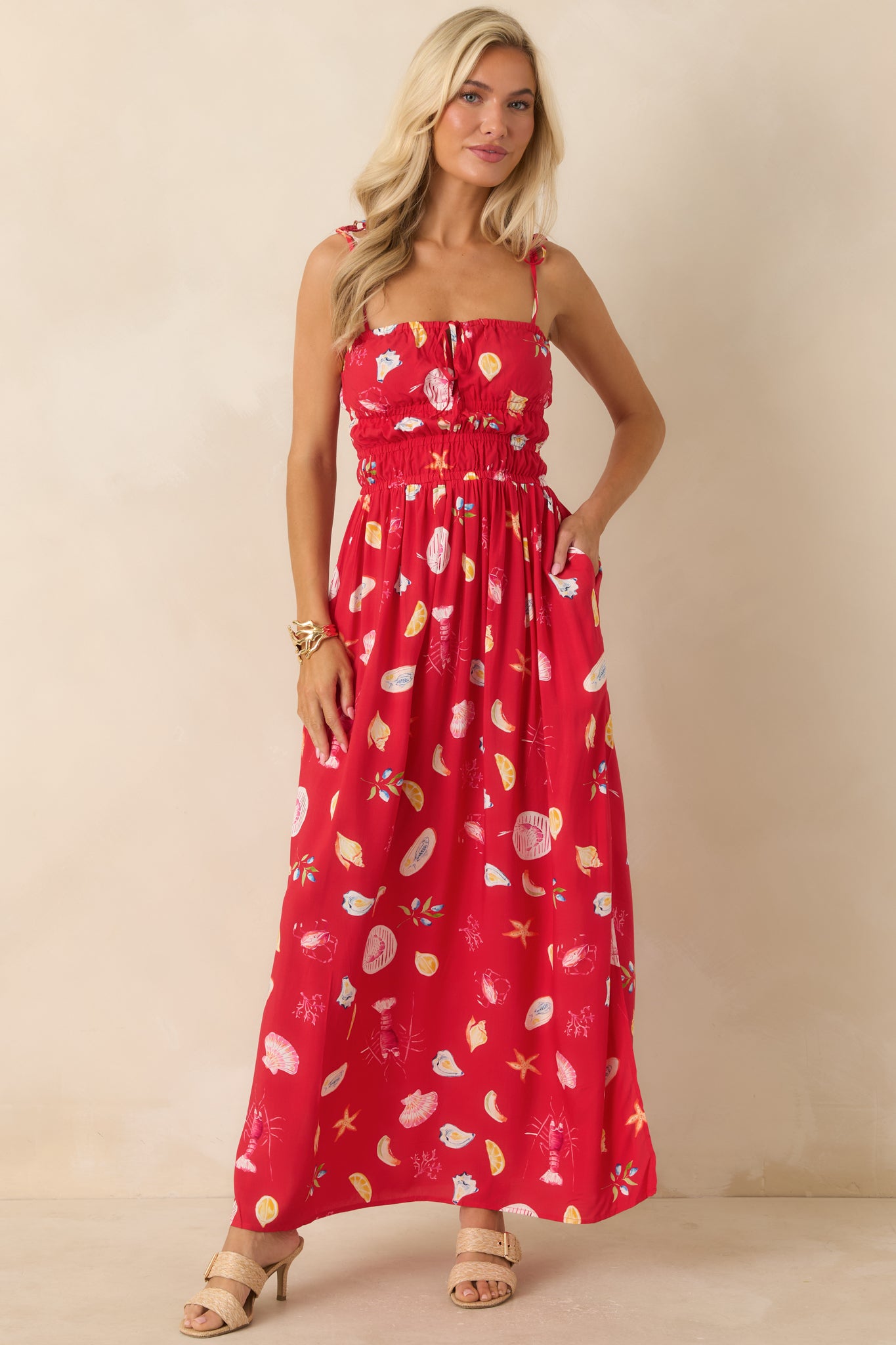 Effortless maxi dress with a fitted smocked bodice, relaxed skirt, and practical side pockets.