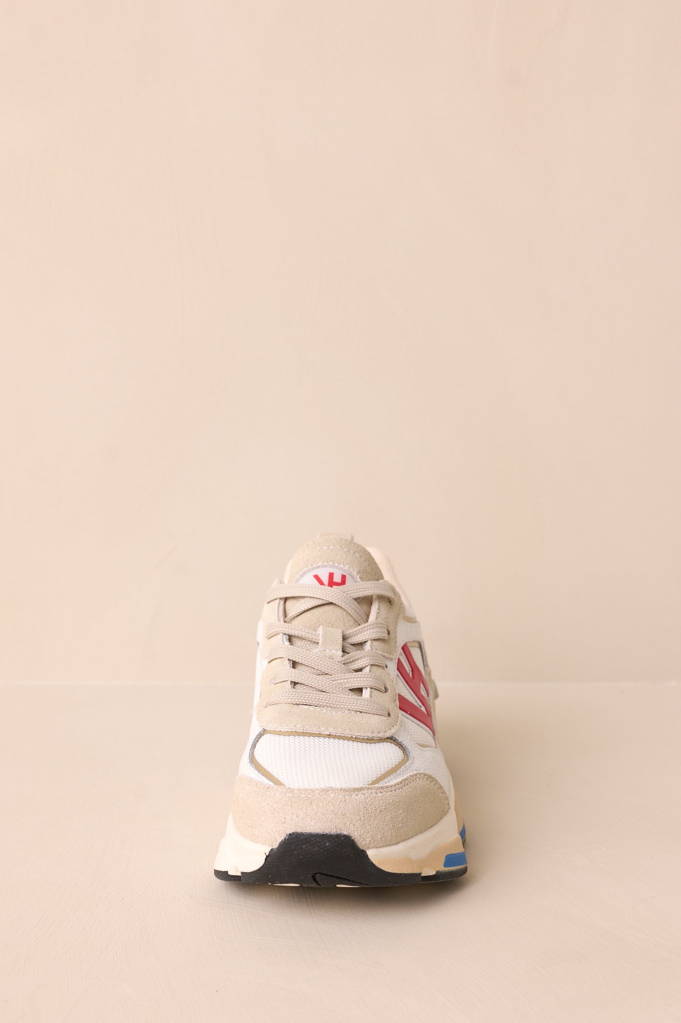 Cropped front detail focusing on the rounded toe, laces, and grey upper material.