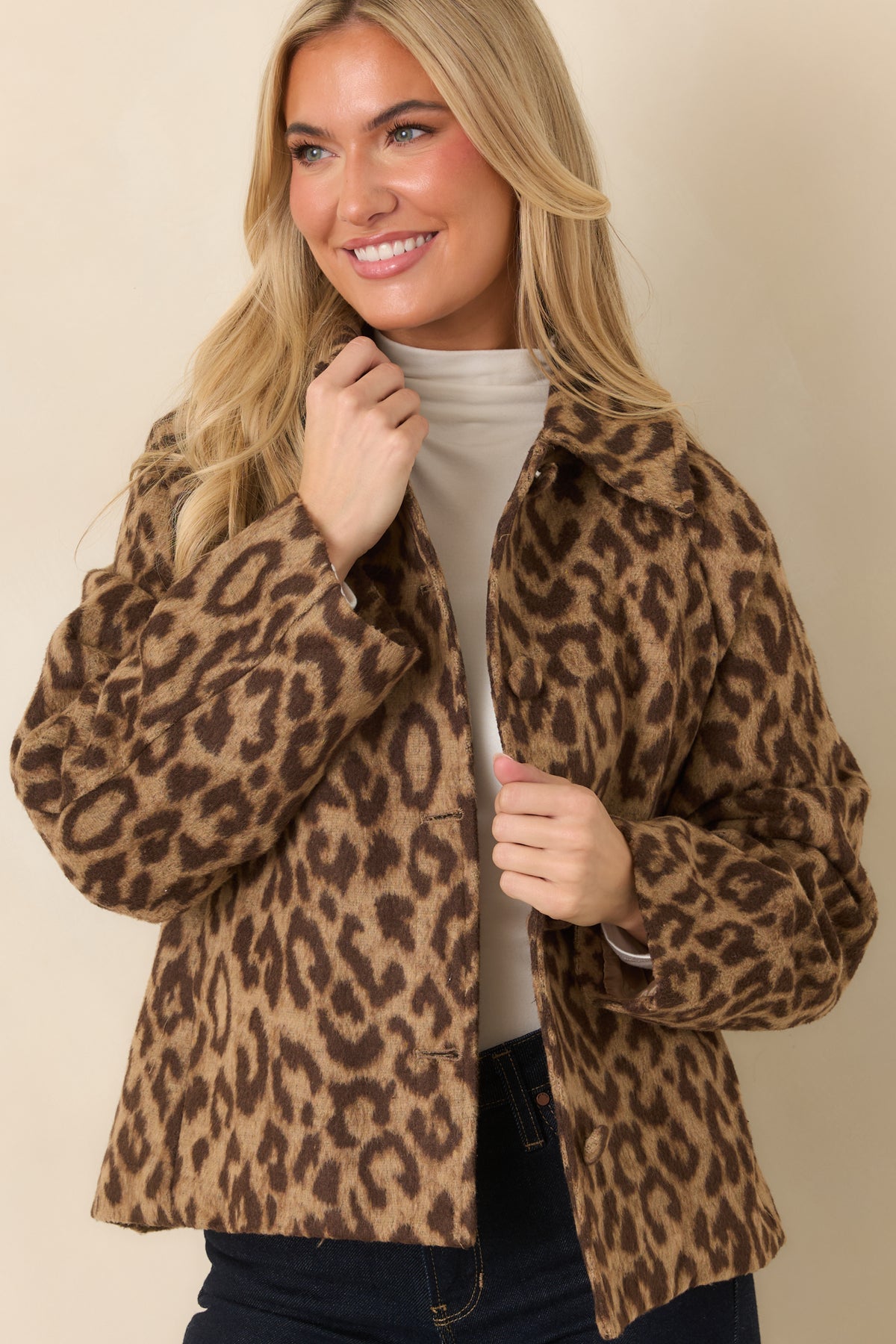 Soft brushed texture gives the camel and brown leopard print jacket a cozy finish.