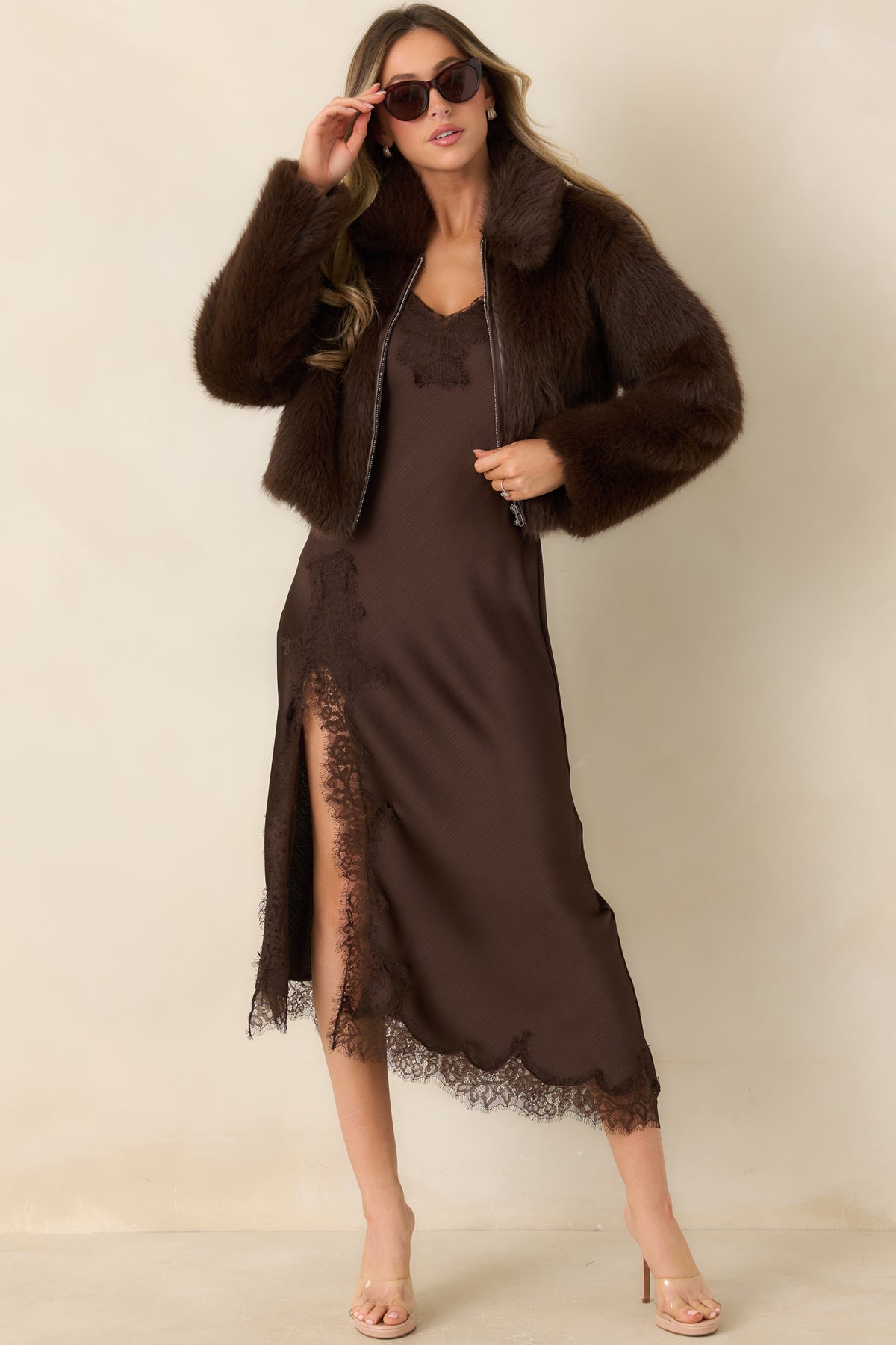 Soft faux fur coat with a relaxed silhouette and full-length sleeves.