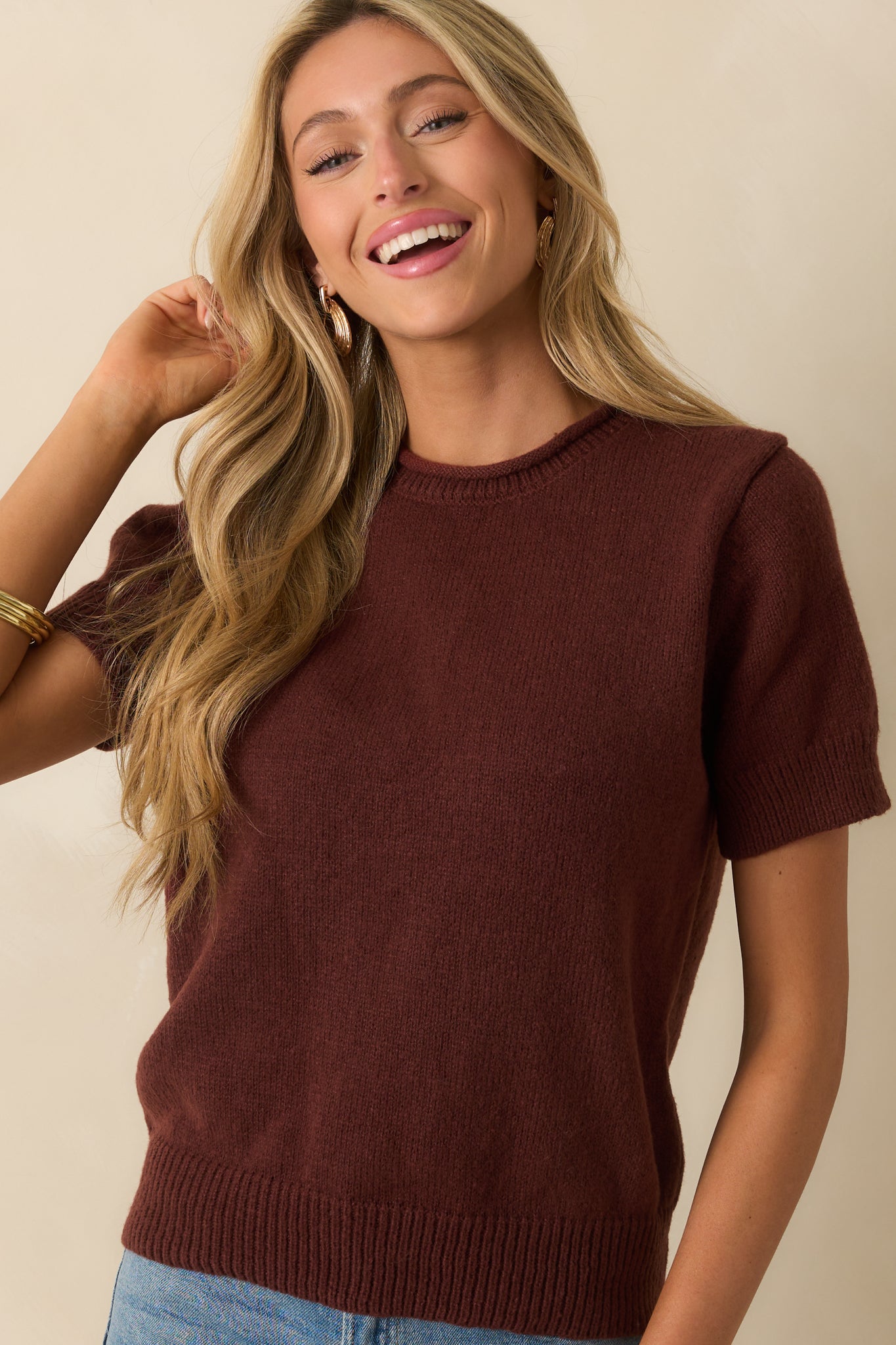 Focus on the soft knit fabric and clean crew neckline.