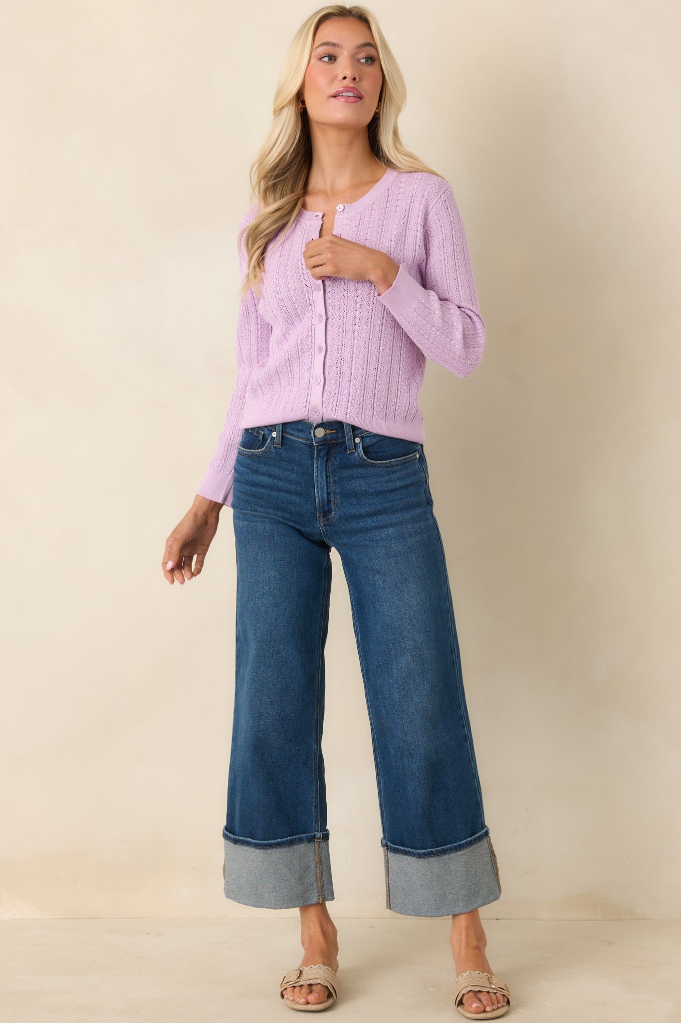 Soft lilac cardigan, with detailed cable knit patterning and an easy, wearable silhouette.
