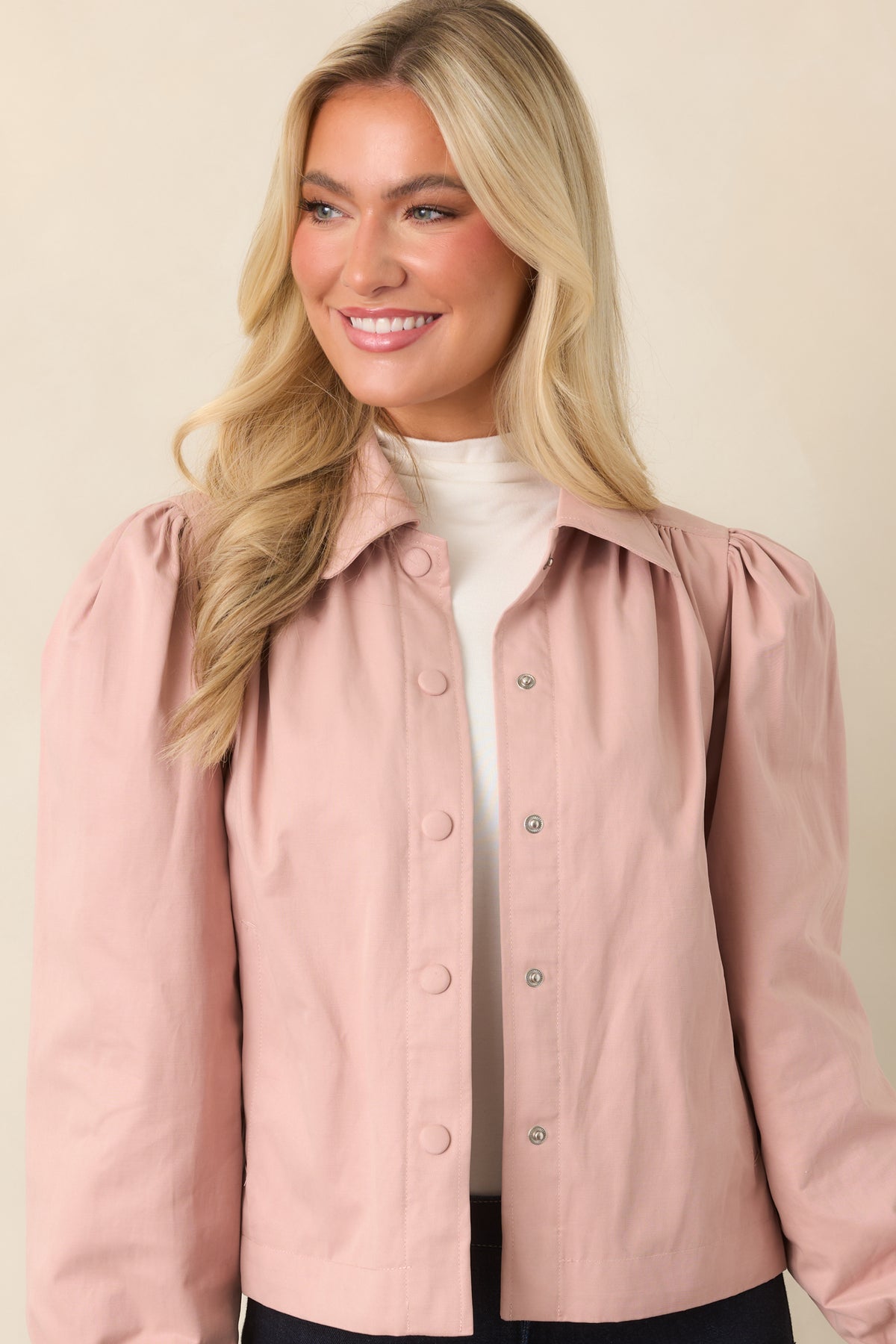 Soft pink jacket with elasticized cuffs that add definition to the puff sleeves.