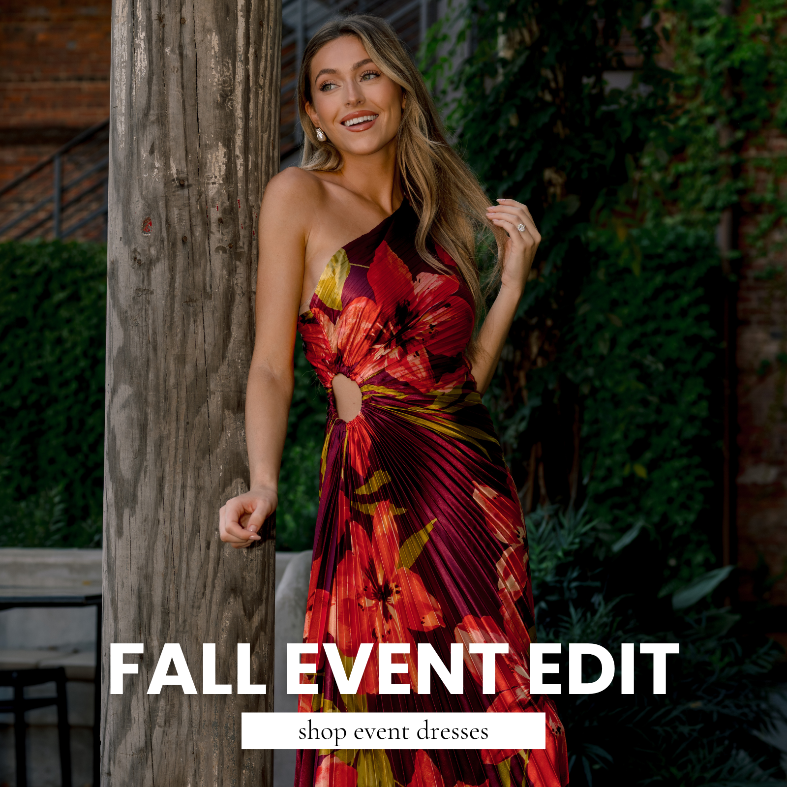 Model wearing a red and burgundy floral one-shoulder dress with a cutout waist, posing outdoors. Text reads “Fall Event Edit” and “Shop Event Dresses.”