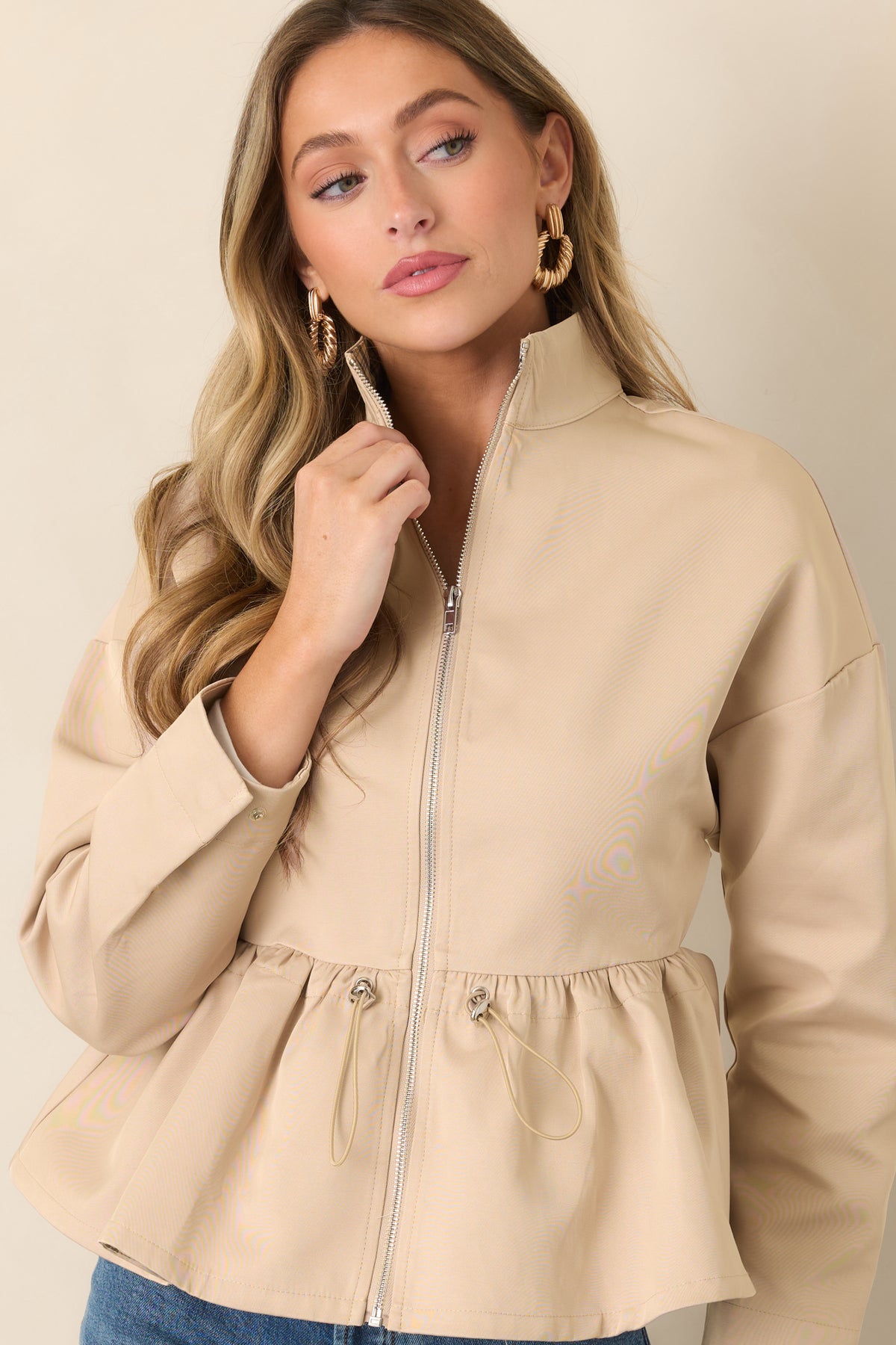 Stand collar and full zipper define this cotton-blend jacket.