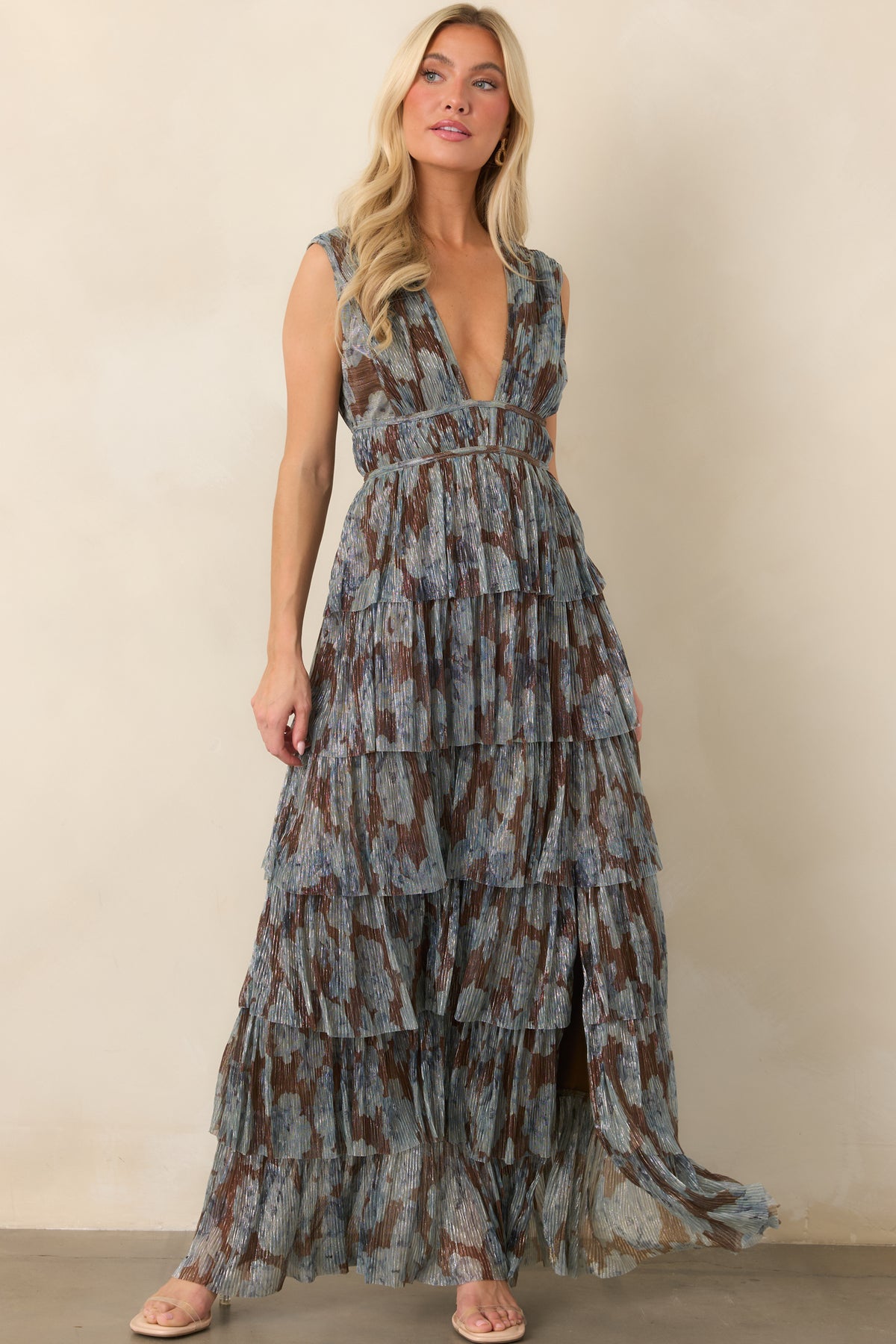 Steel blue floral dress with chocolate accents, a plunging V-neck, and layered tiered skirt.