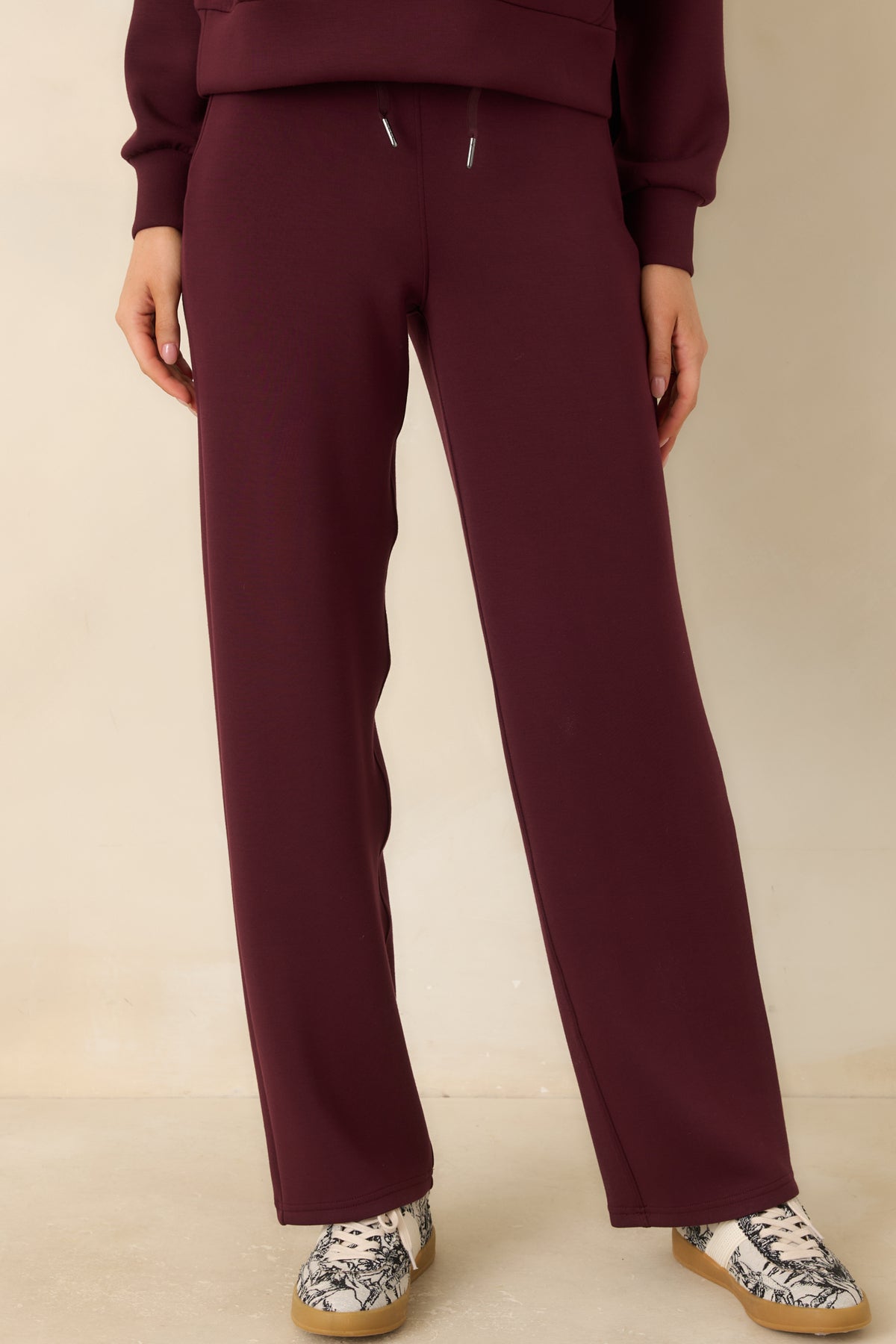 Straight-leg pants with an adjustable drawstring waistband and a relaxed fit through the hips.