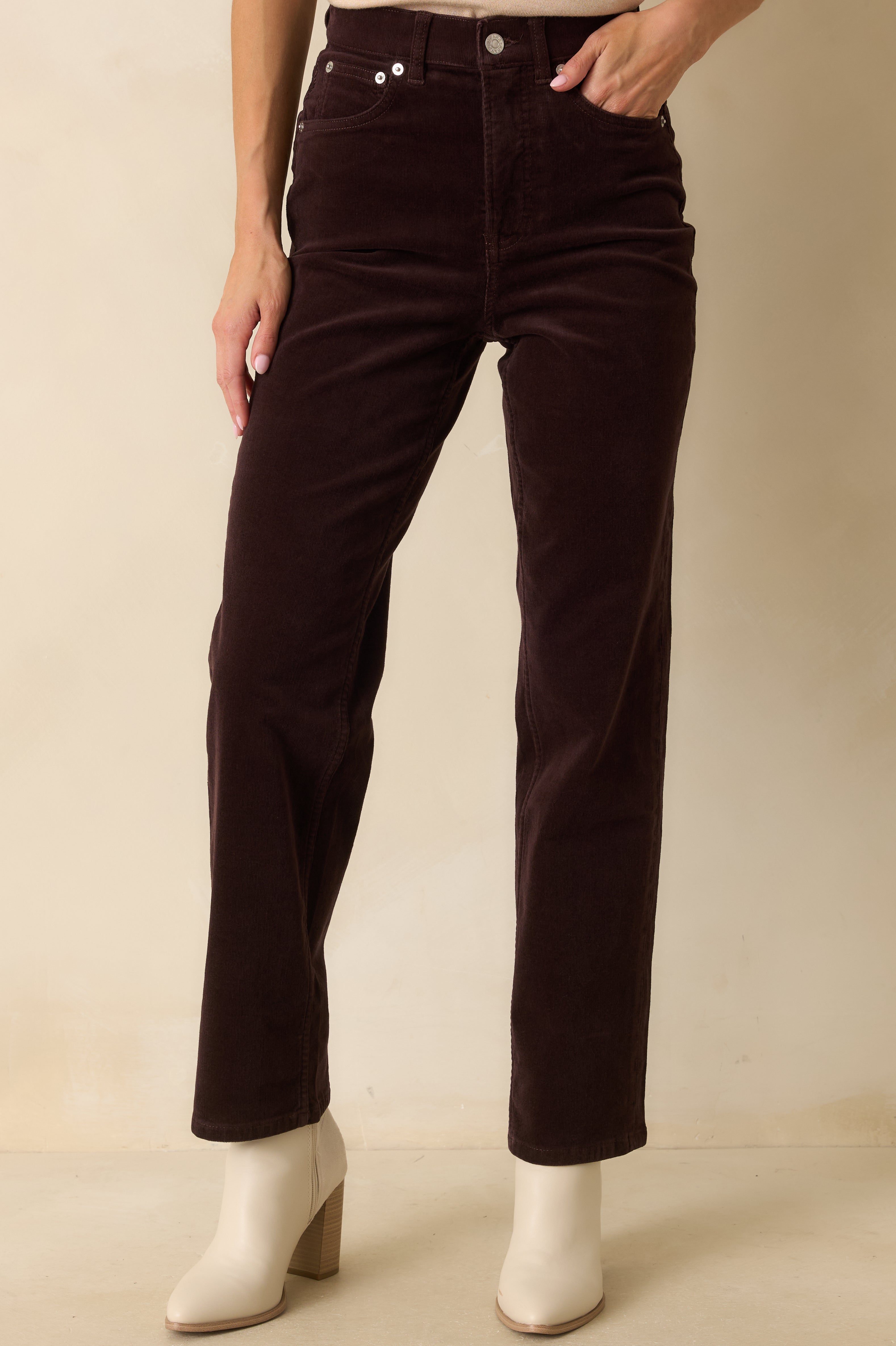 Focus on the straight-leg silhouette and smooth corduroy texture.