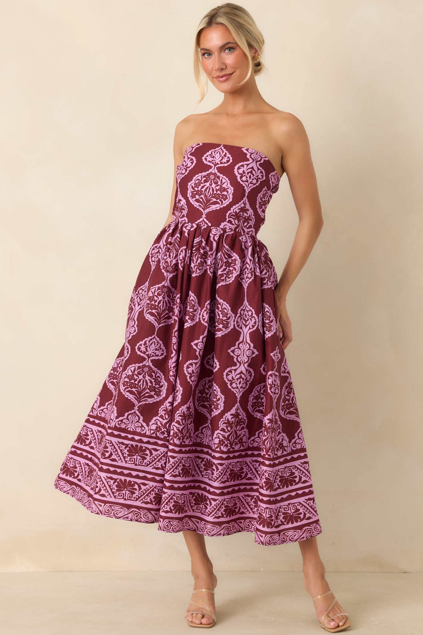 Strapless medallion print midi dress with a comfortable smocked back, side pockets, and graceful full skirt.