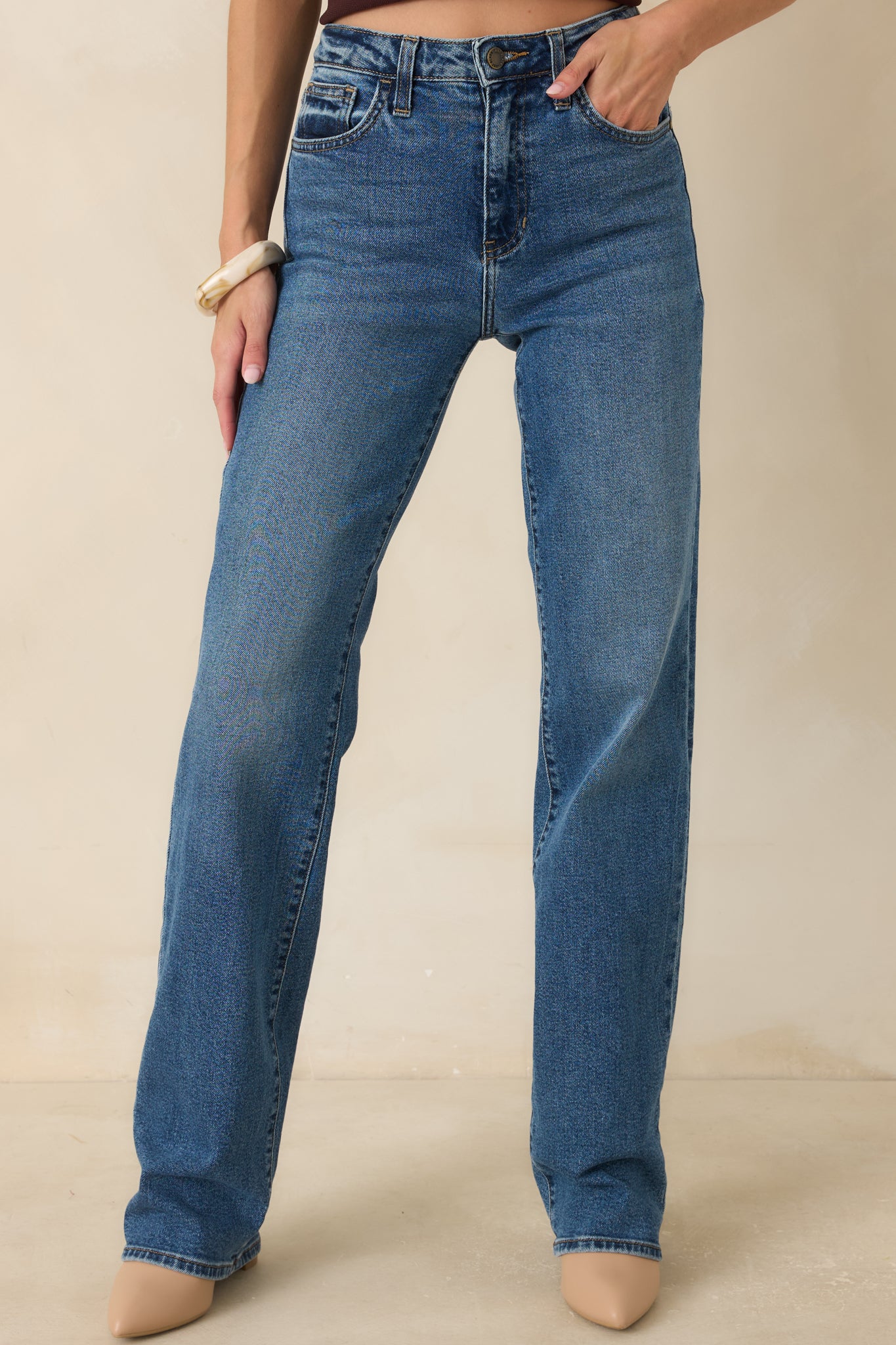 Close view of the fabric highlighting the smooth texture and subtle stretch that enhances comfort and fit.