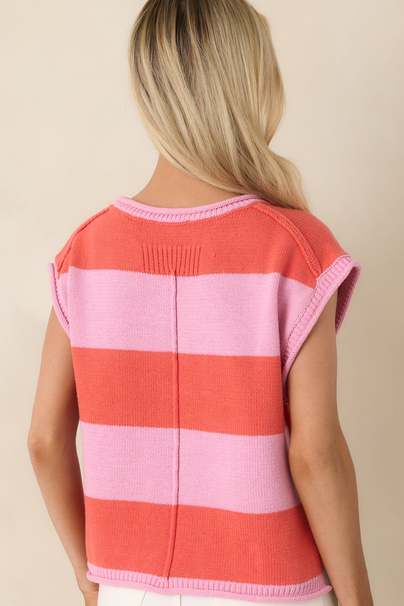 Striped cotton-blend knit top with relaxed silhouette from rear.