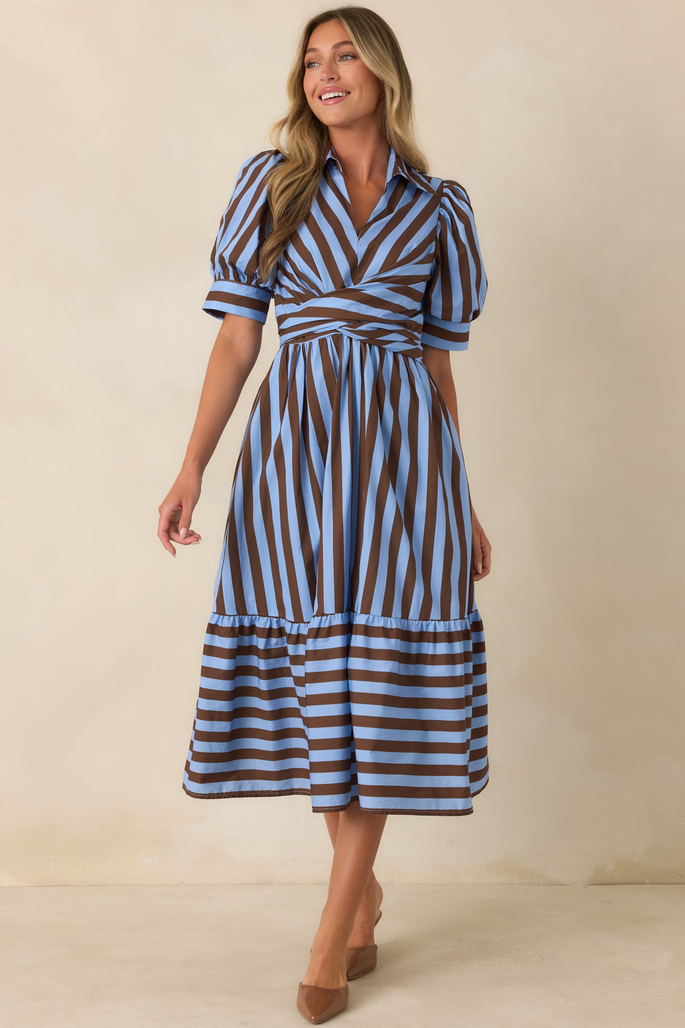 Striped cotton midi dress designed with a collared V-neck, short puff sleeves, and wraparound waist ties.