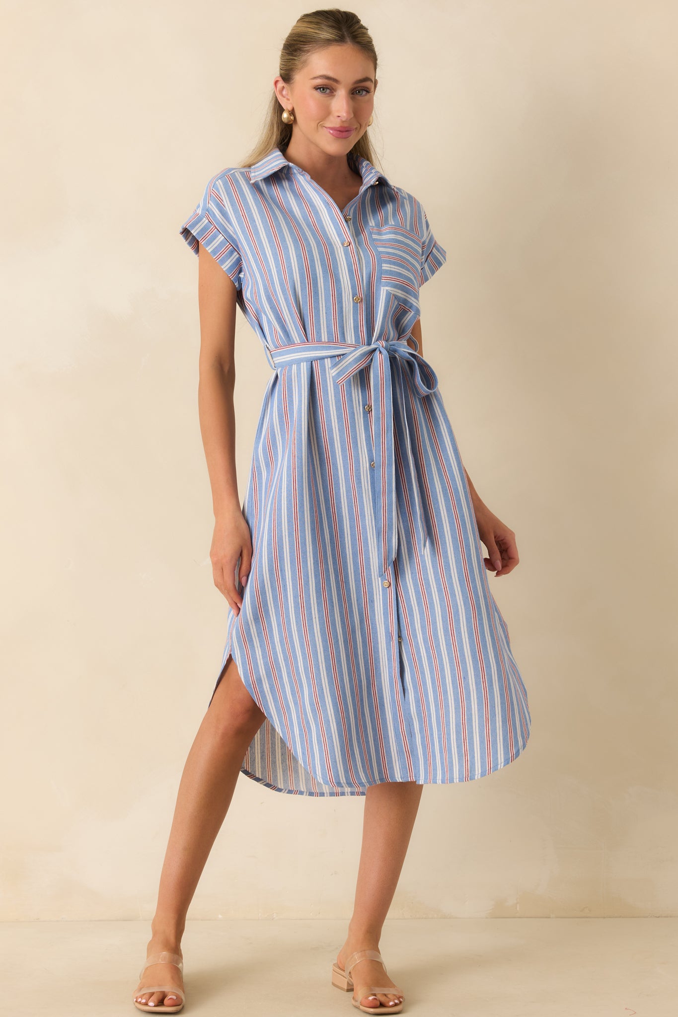 Midi-length striped dress featuring a tailored collar, adjustable self-tie belt, chest pocket, and polished gold-tone button details.