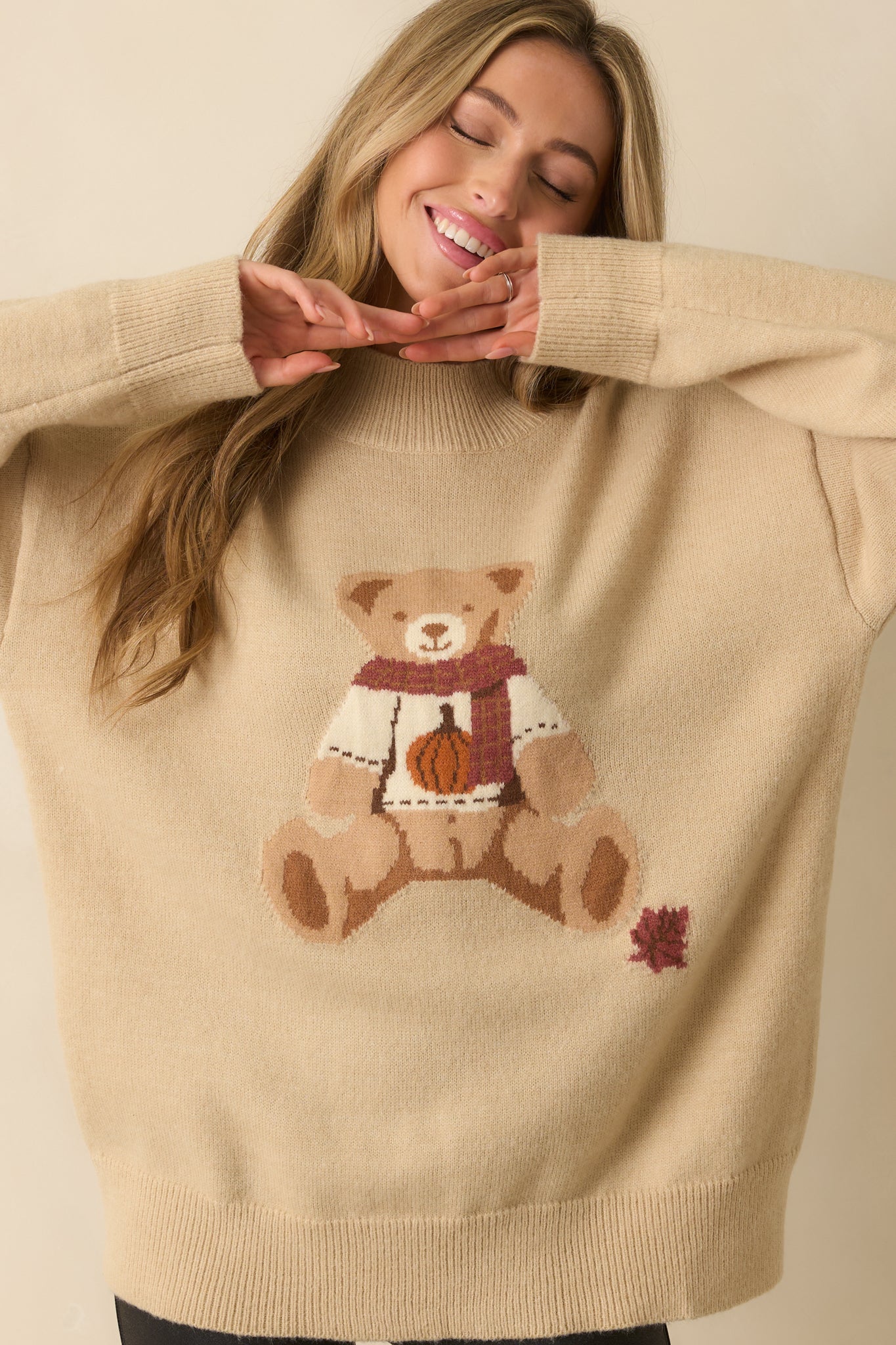 A close cropped shot emphasizing the oversized fit and graphic placement.