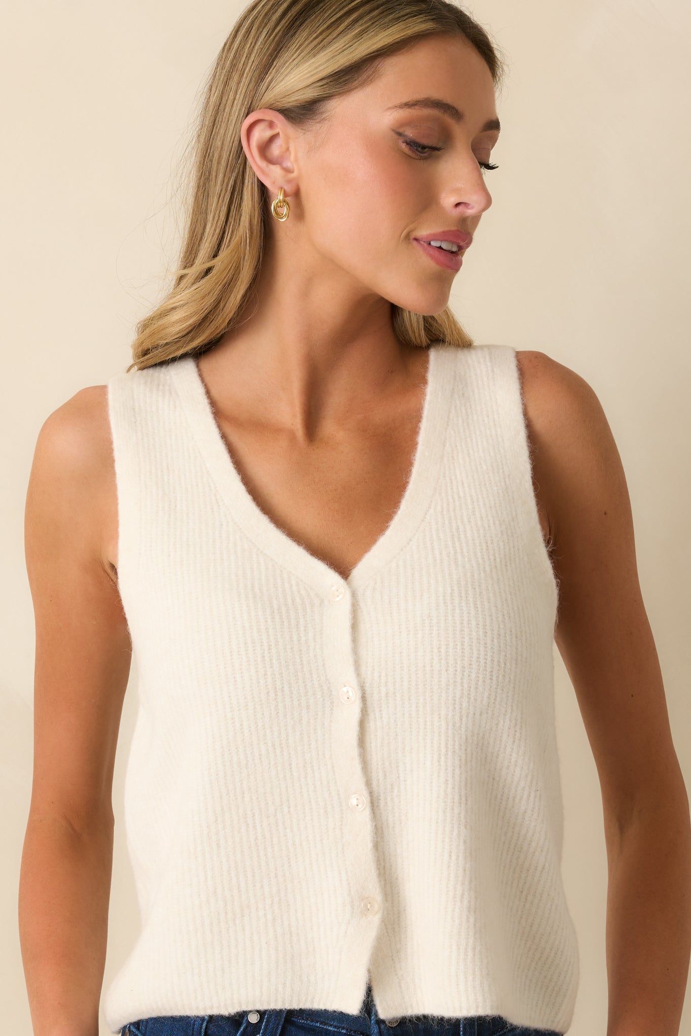 Cropped angle highlighting the sleeveless design and relaxed fit.