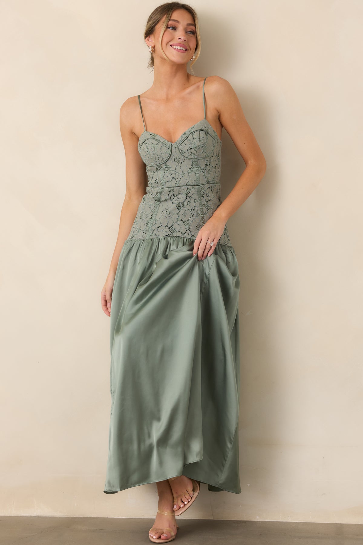 Sweetheart maxi dress featuring a fitted bustier bodice and gathered skirt.