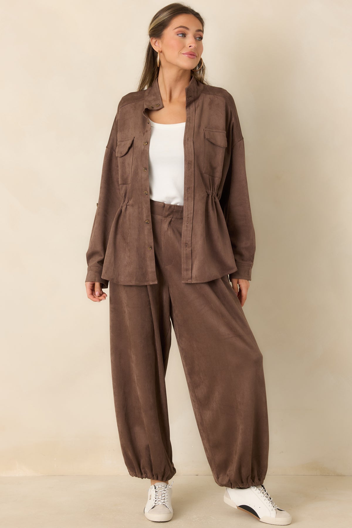 Tailored faux suede pants with front pleats and softly gathered ankle hems.