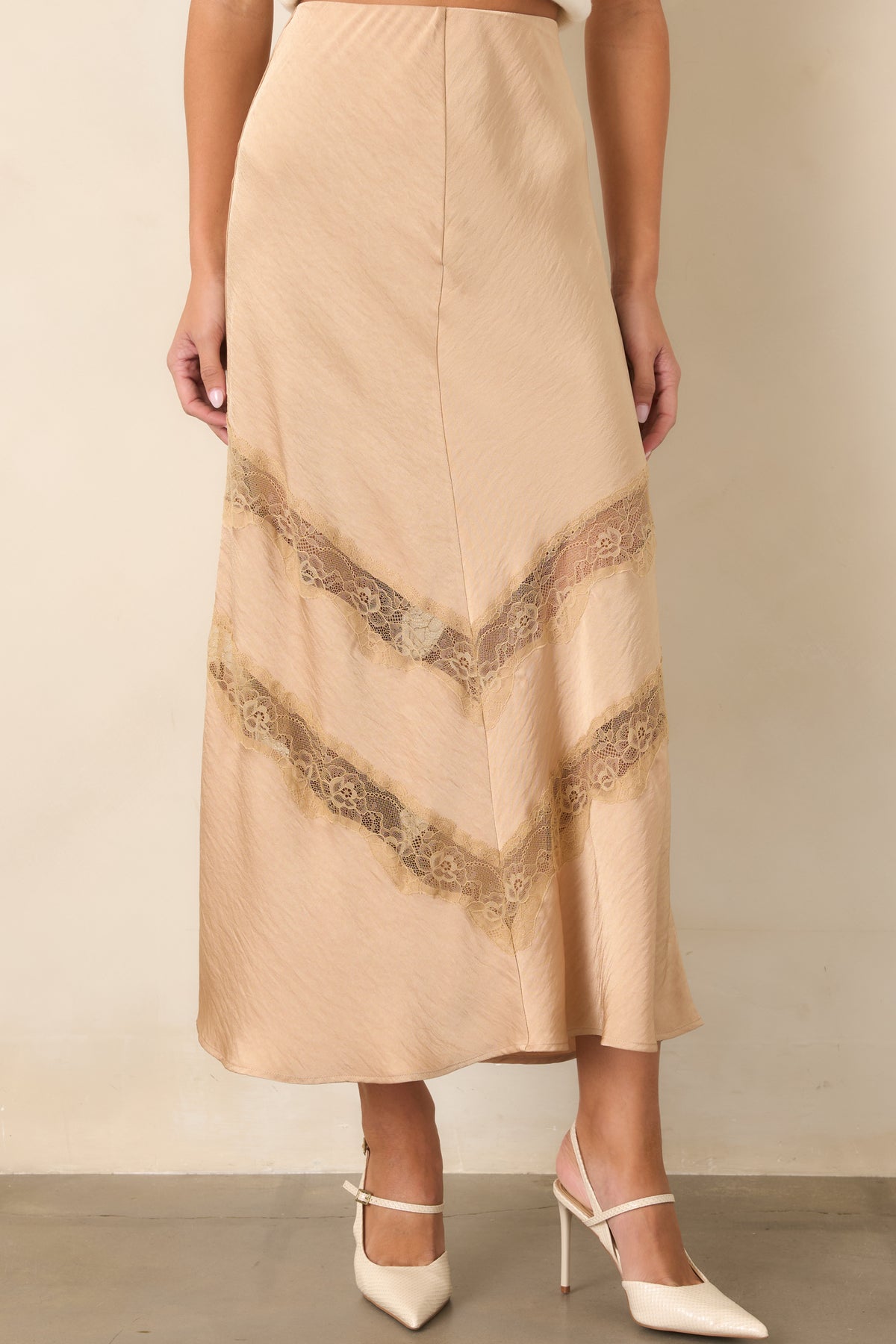  Tan crinkled skirt featuring angled chevron lace detailing for subtle contrast.