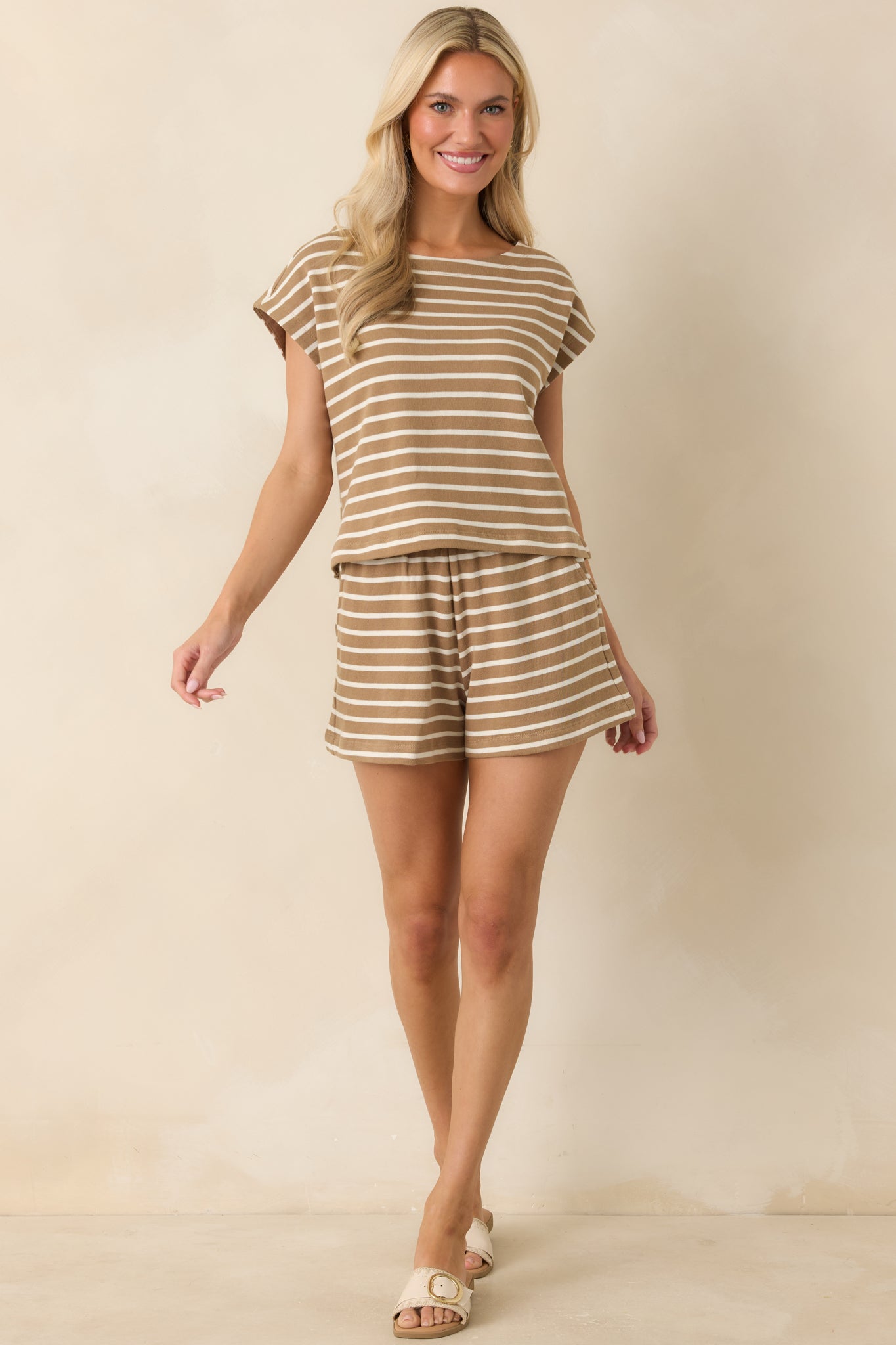 Taro brown and ivory knit top with a boat neckline, short cap sleeves, and classic horizontal stripe pattern.