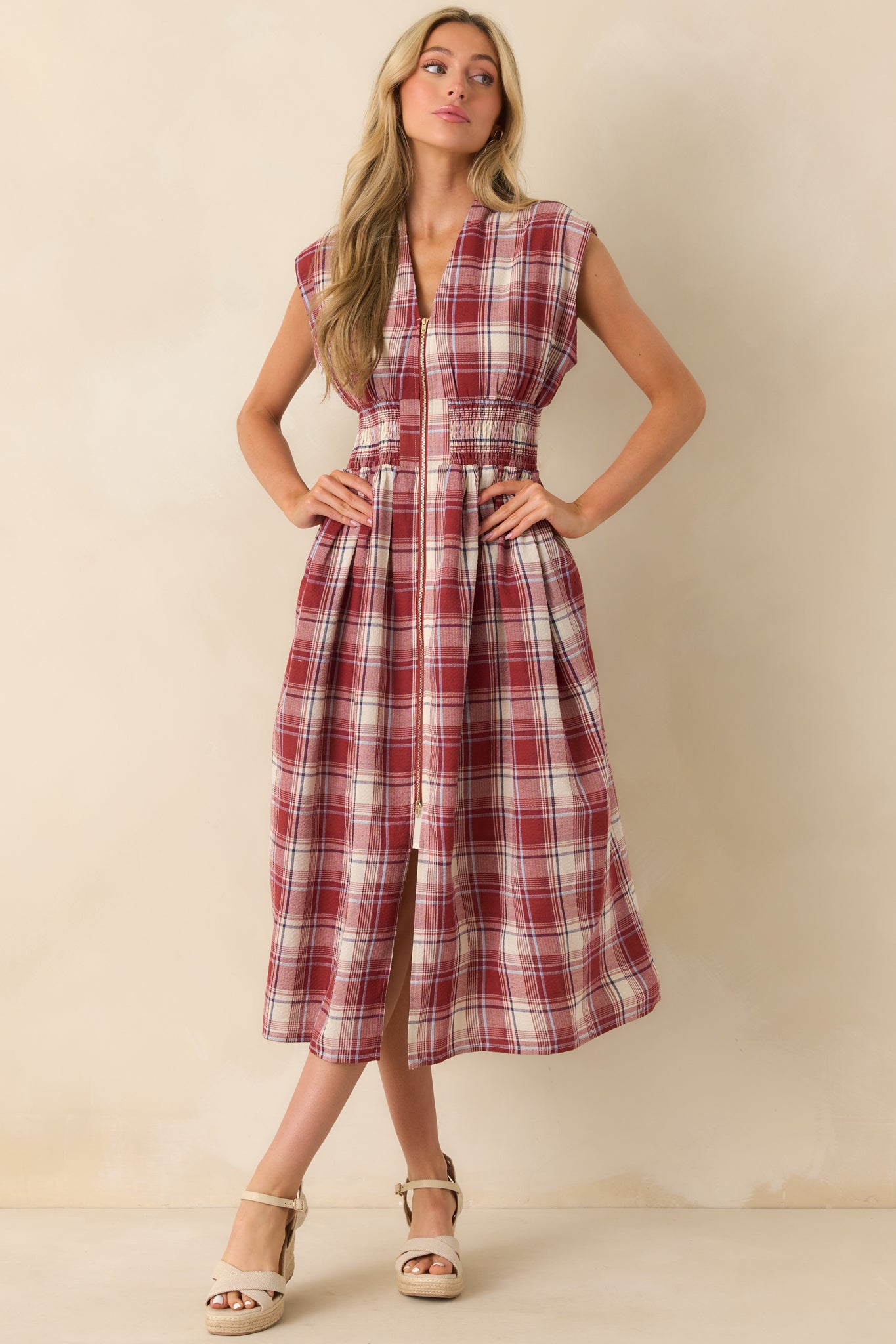 Tartan print midi dress showing capped sleeves, front slit, and classic red pattern.