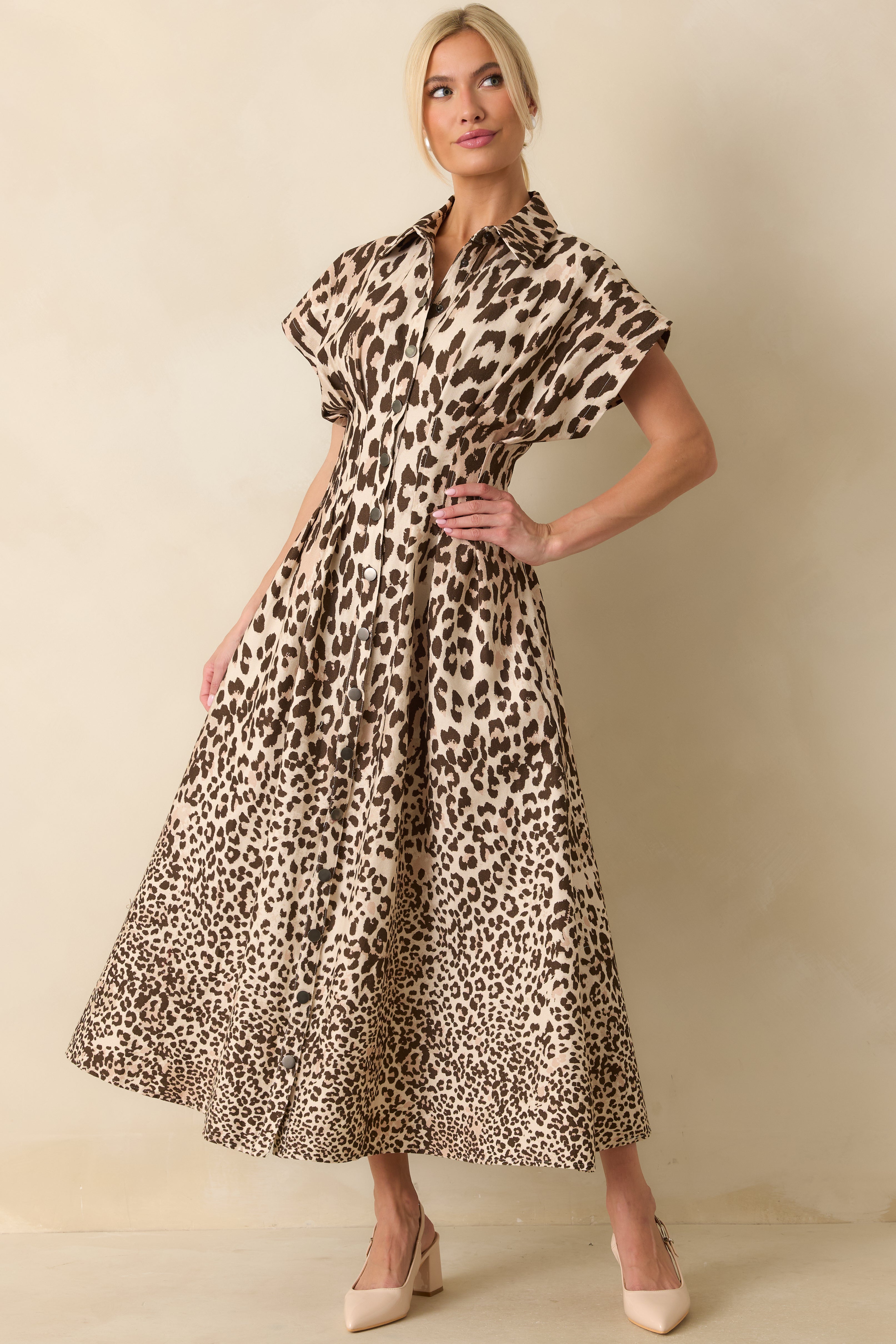 Taupe cotton twill maxi dress with an allover animal print pattern and a defined waist creating a flattering shape.