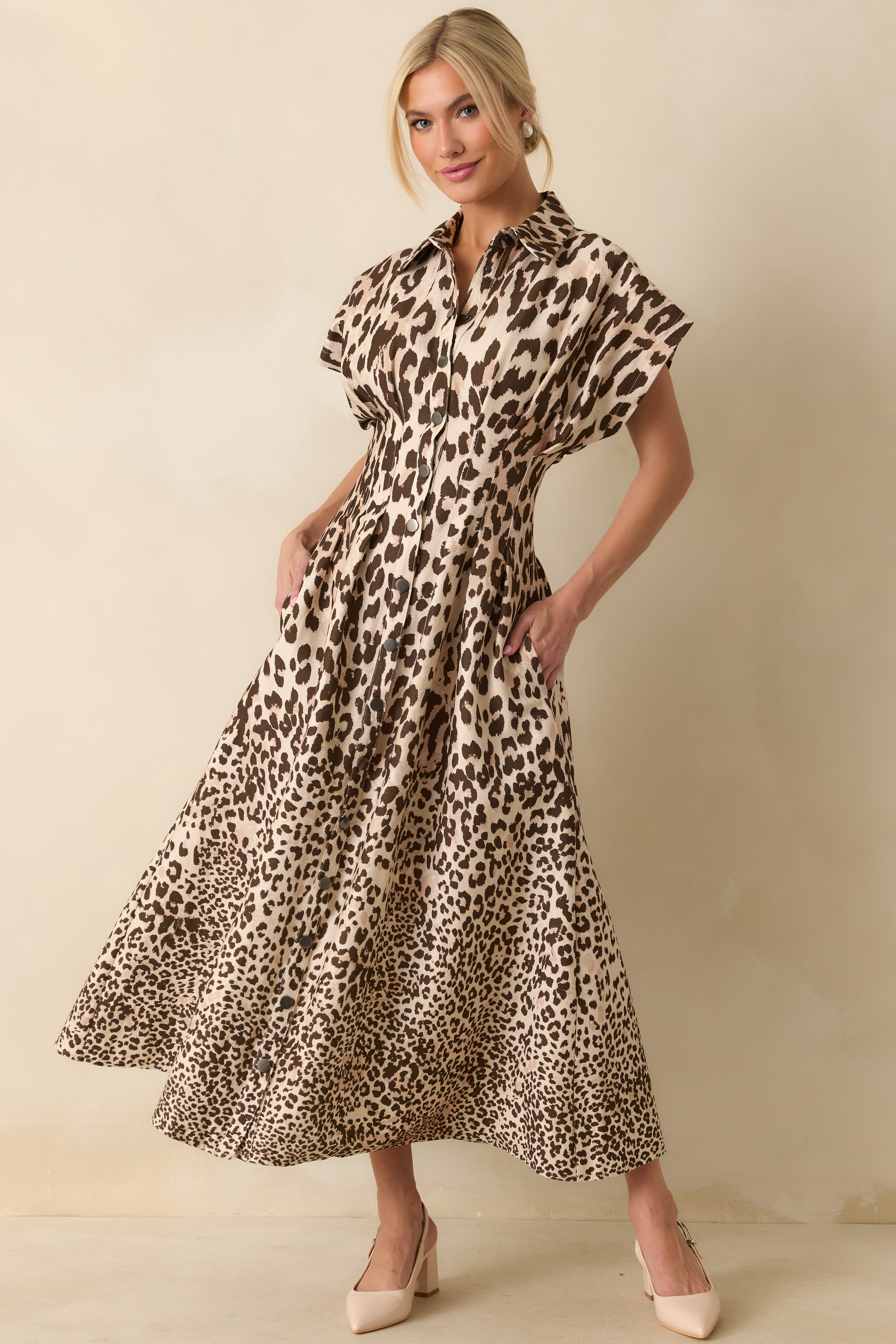 Front angle of the taupe leopard print dress emphasizing the collared neckline and button-front design for a casual yet tailored look.