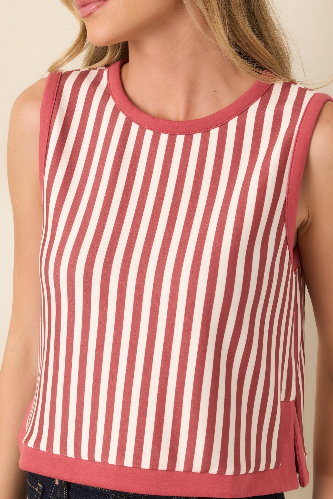 Close-up of the terracotta and ivory striped fabric, highlighting the vertical pattern, smooth texture, and contrasting terracotta trim.