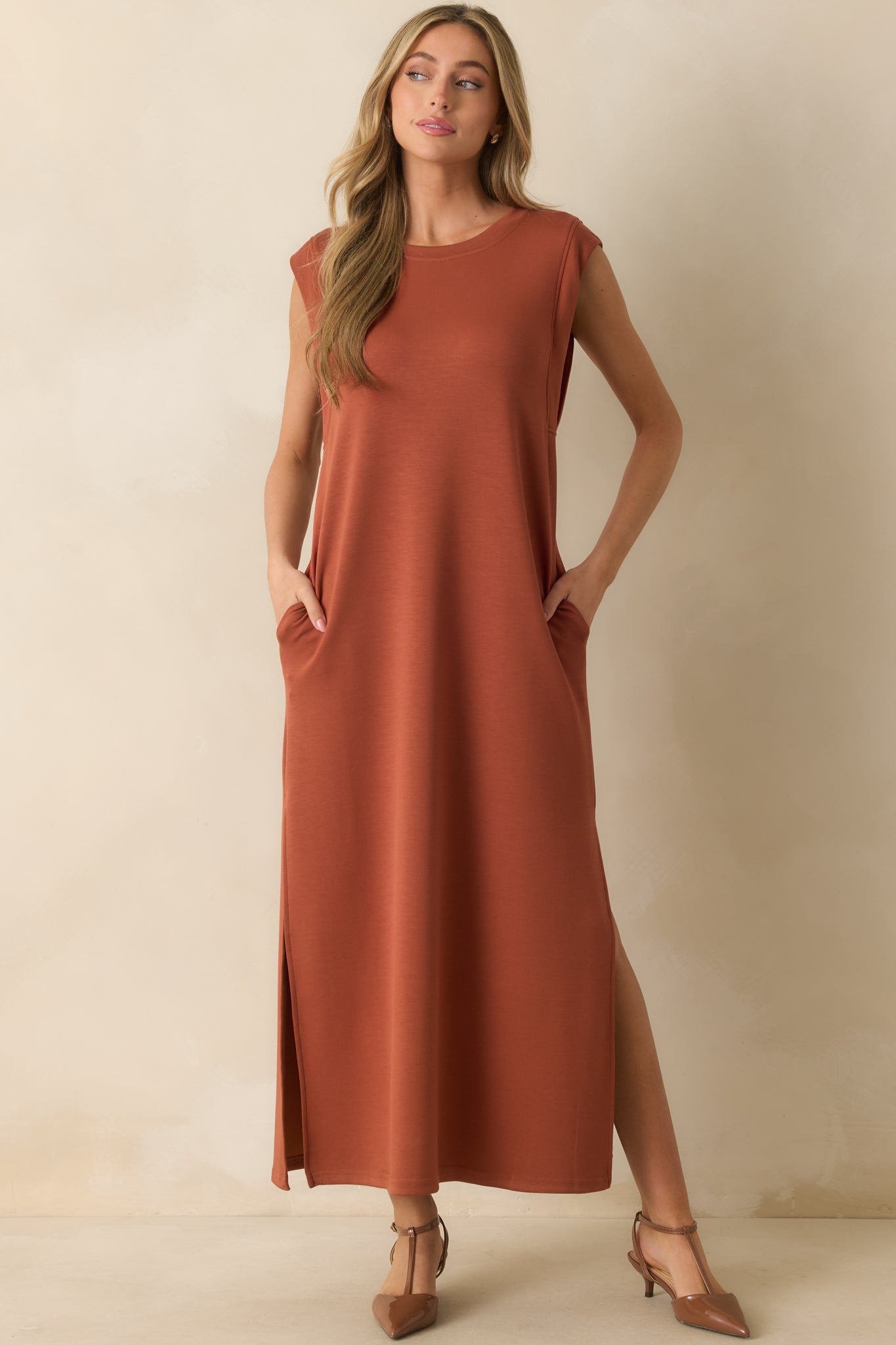 Terracotta orange maxi dress with crew neckline, cap sleeves, and a relaxed straight silhouette.