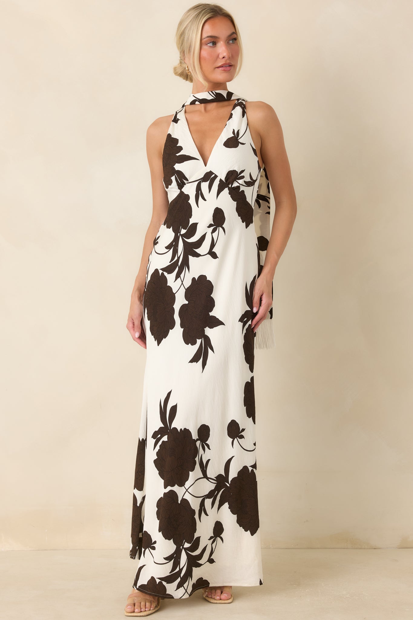 Bias-cut maxi dress with a refined neckline, textured fabric, and effortless elegant movement.